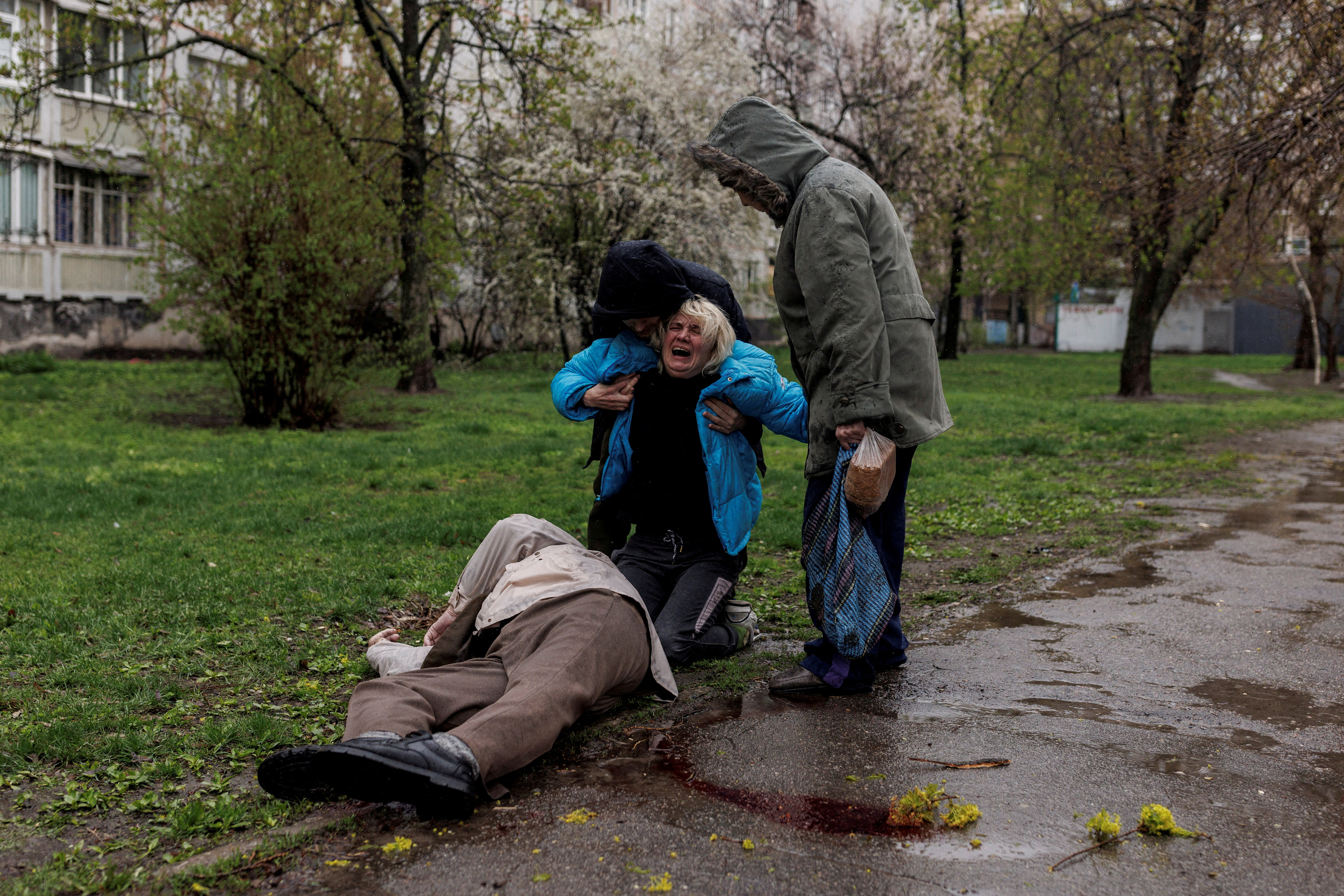 Yana Bachek is consoled by her partner Yevgeniy Vlasenko