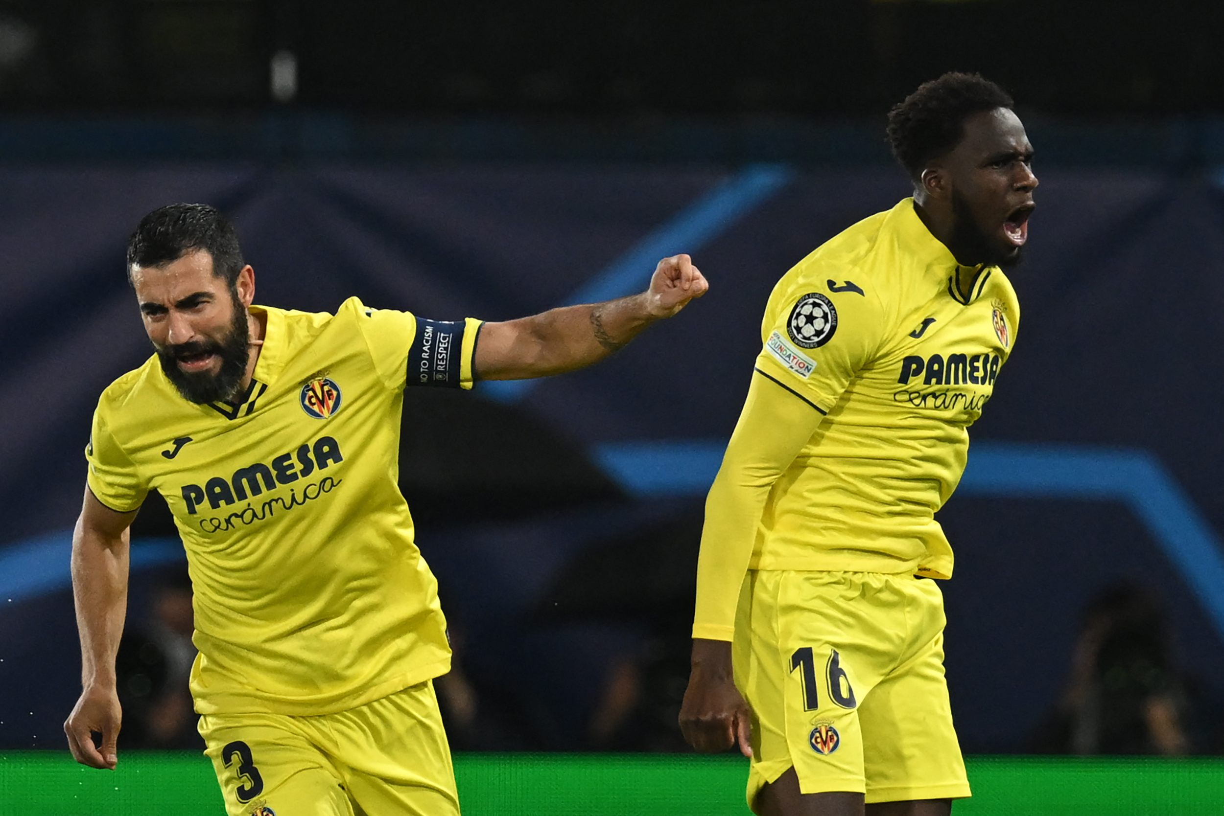 Villarreal’s Senegalese forward Boulaye Dia, right, celebrates after scoring against Liverpool