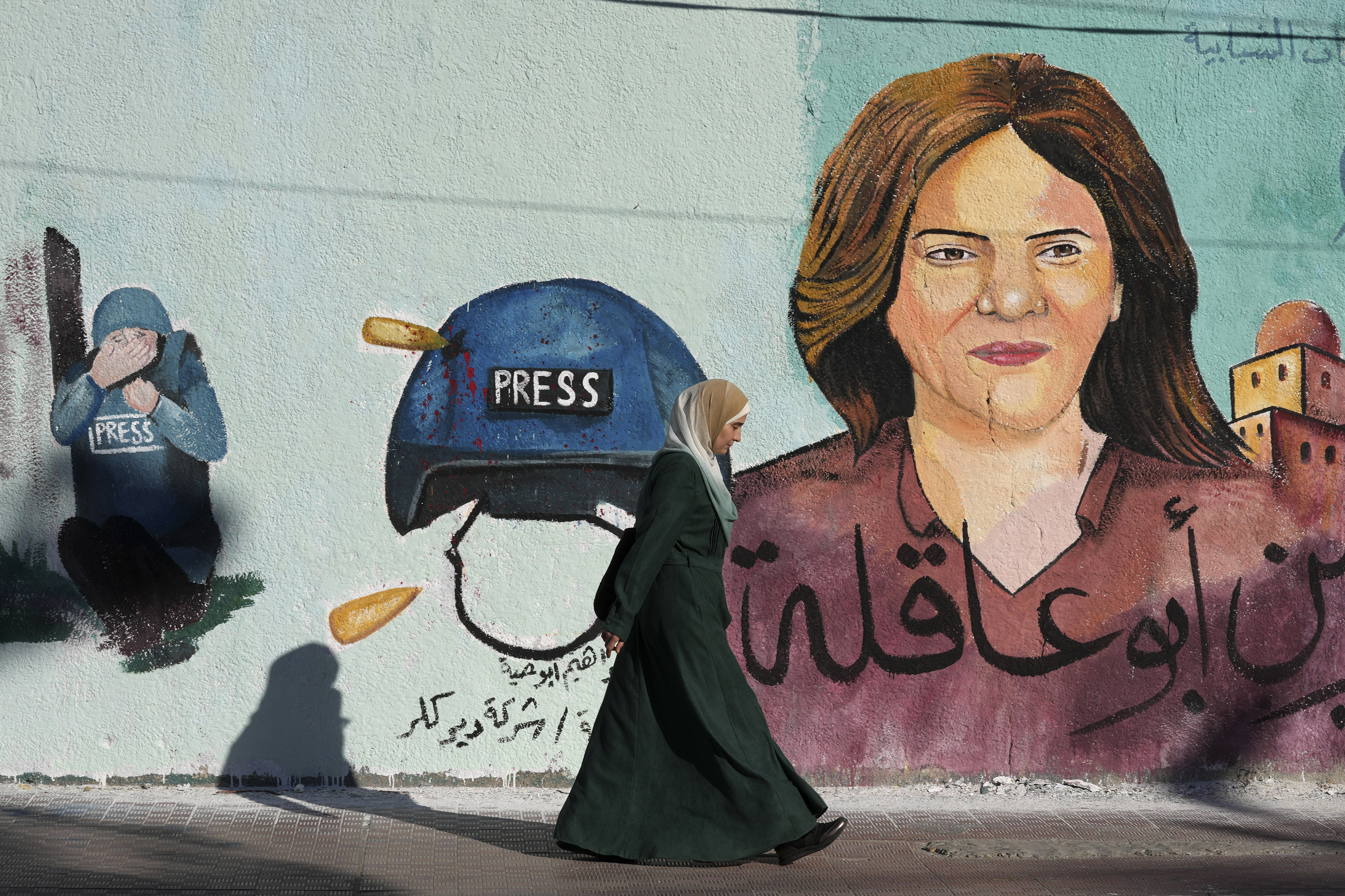 A mural of slain Al Jazeera journalist Shireen Abu Akleh adorns a wall in Gaza City.