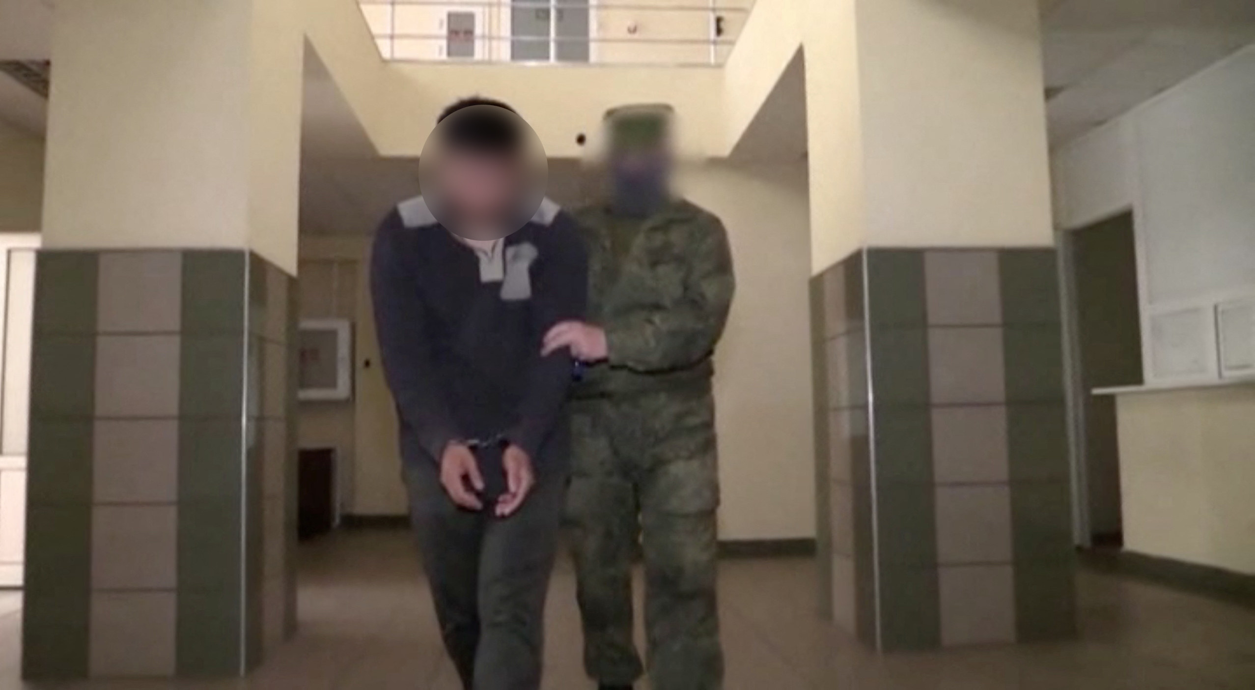 A still image taken from Russian state TV footage purports to show Andy Huynh at an unknown location [Reuters]