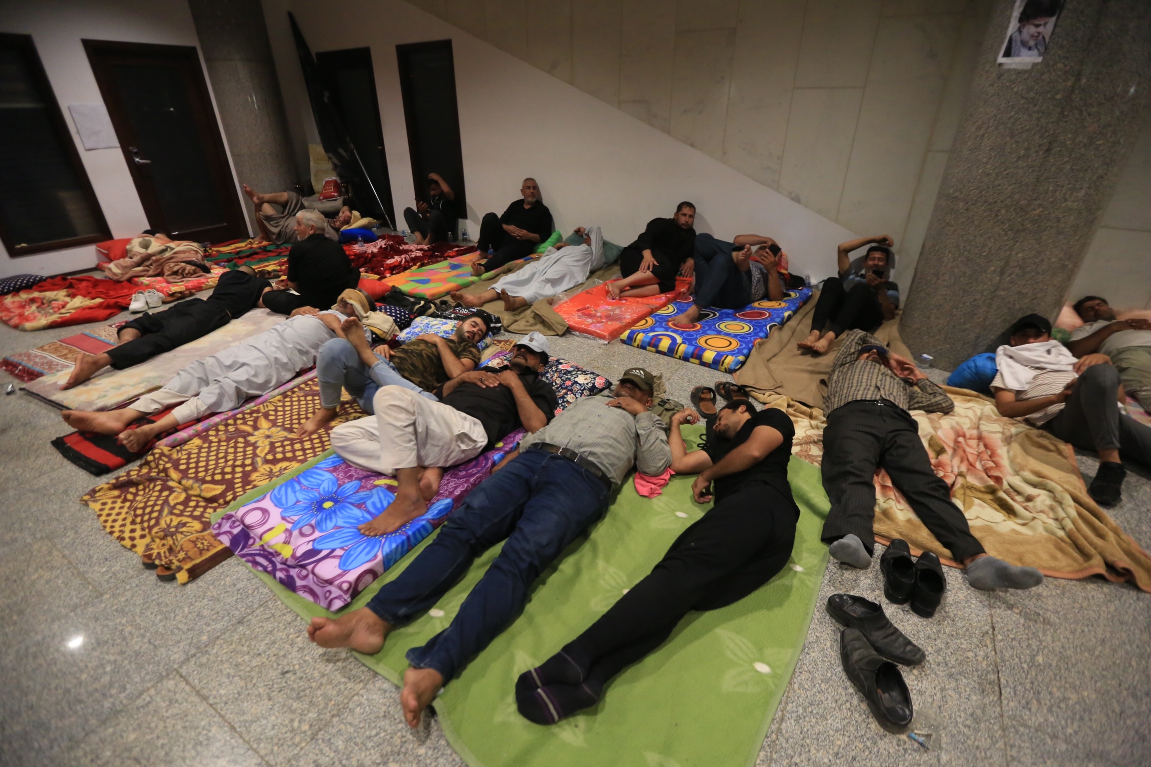 Supporters of Shiite cleric Moqtada al-Sadr continue