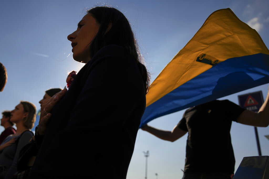 People attend a protest in Istanbul against Russia's invasion of Ukraine
