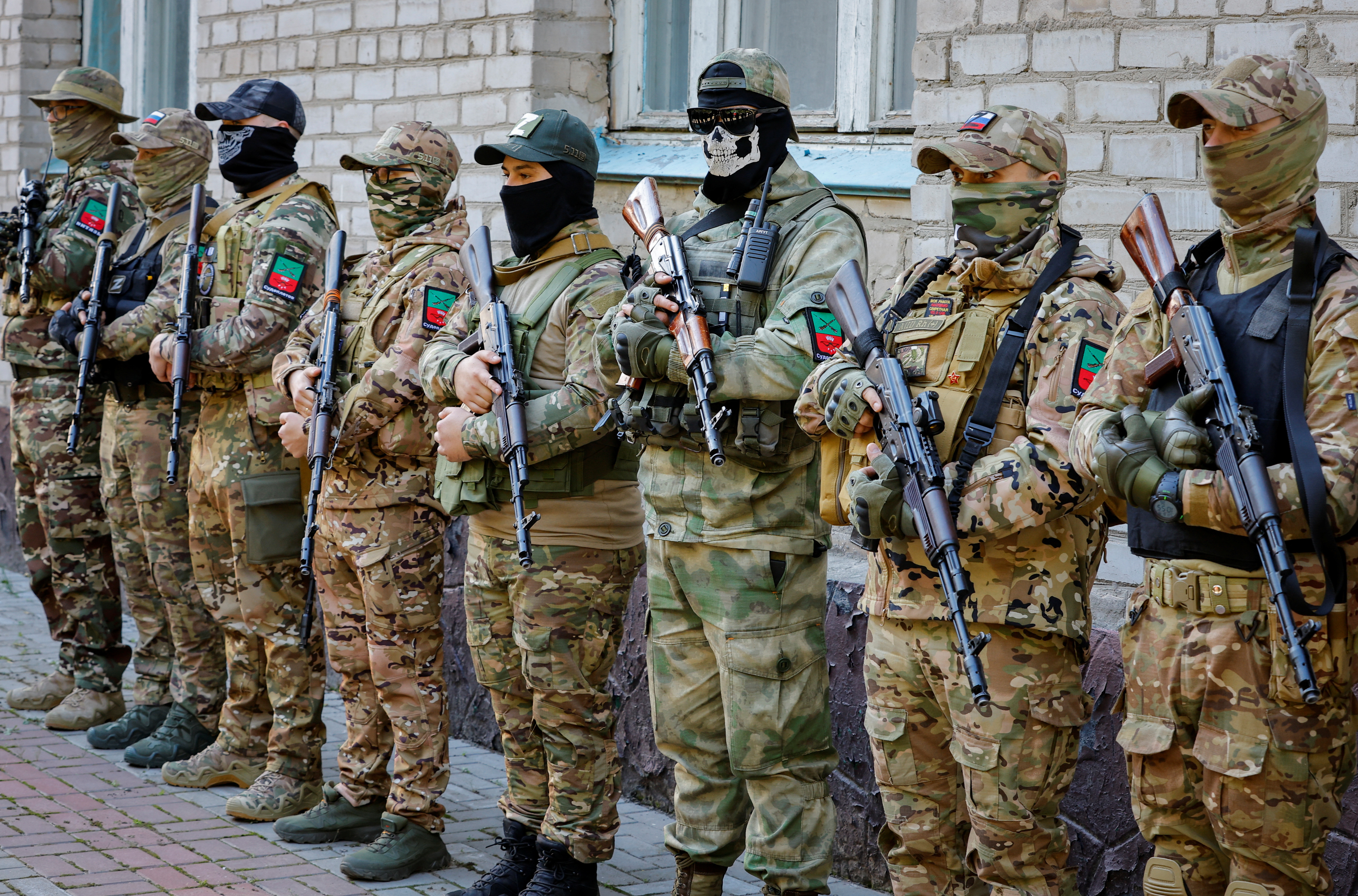 Volunteers of a newly formed battalion take part in the oath-taking ceremony in the city of Melitopol, Russian-controlled Ukraine October 13, 2022. REUTERS/Alexander Ermochenko