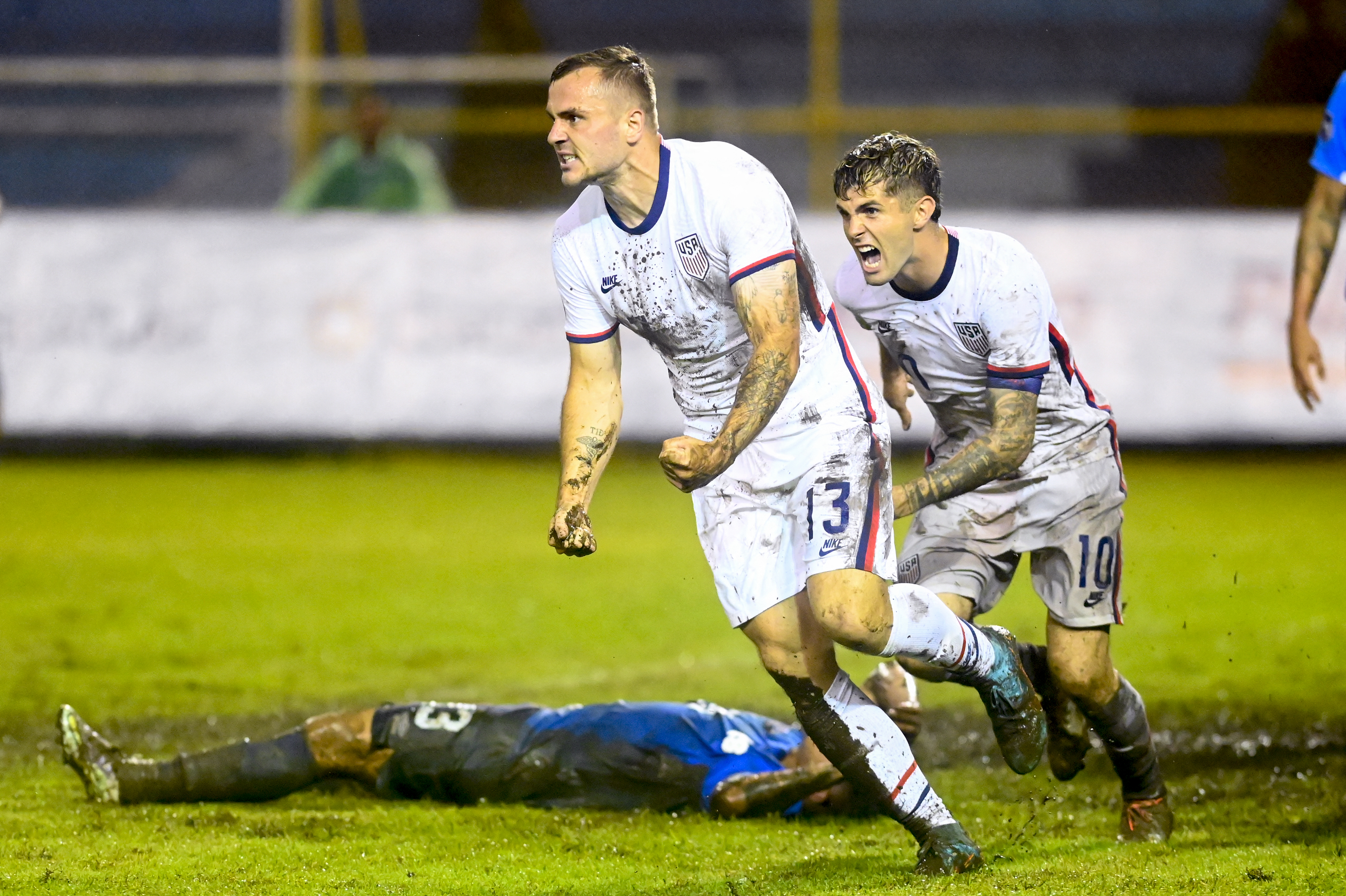 USA’s Christian Pulisic (right) and Jordan Morris celebrate a goal against El Salvador during their Concacaf Nations League football match at the Cuscatlan stadium, in San Salvador, on June 14, 2022