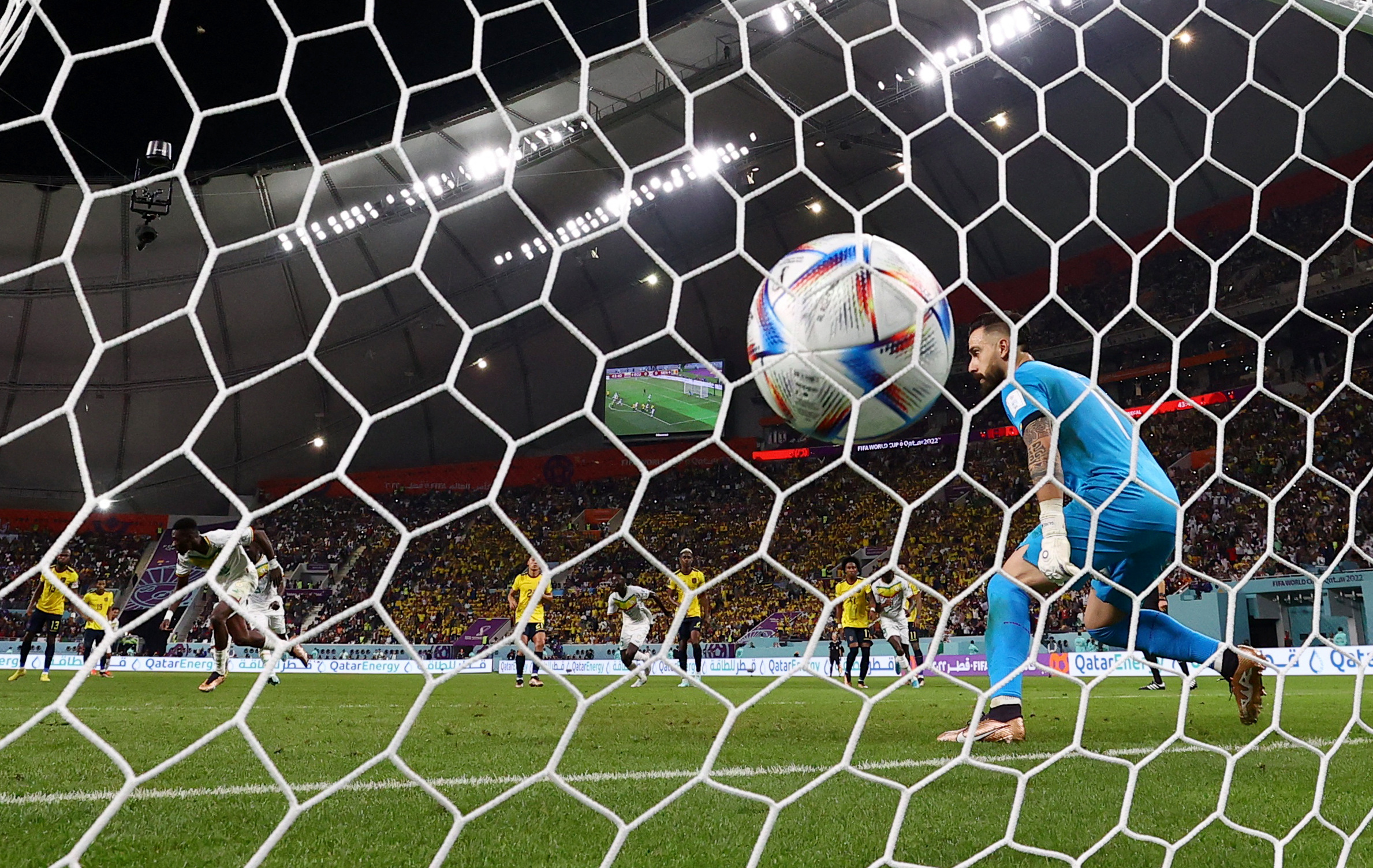 Senegal's Ismaila Sarr scores their first goal from the penalty spot