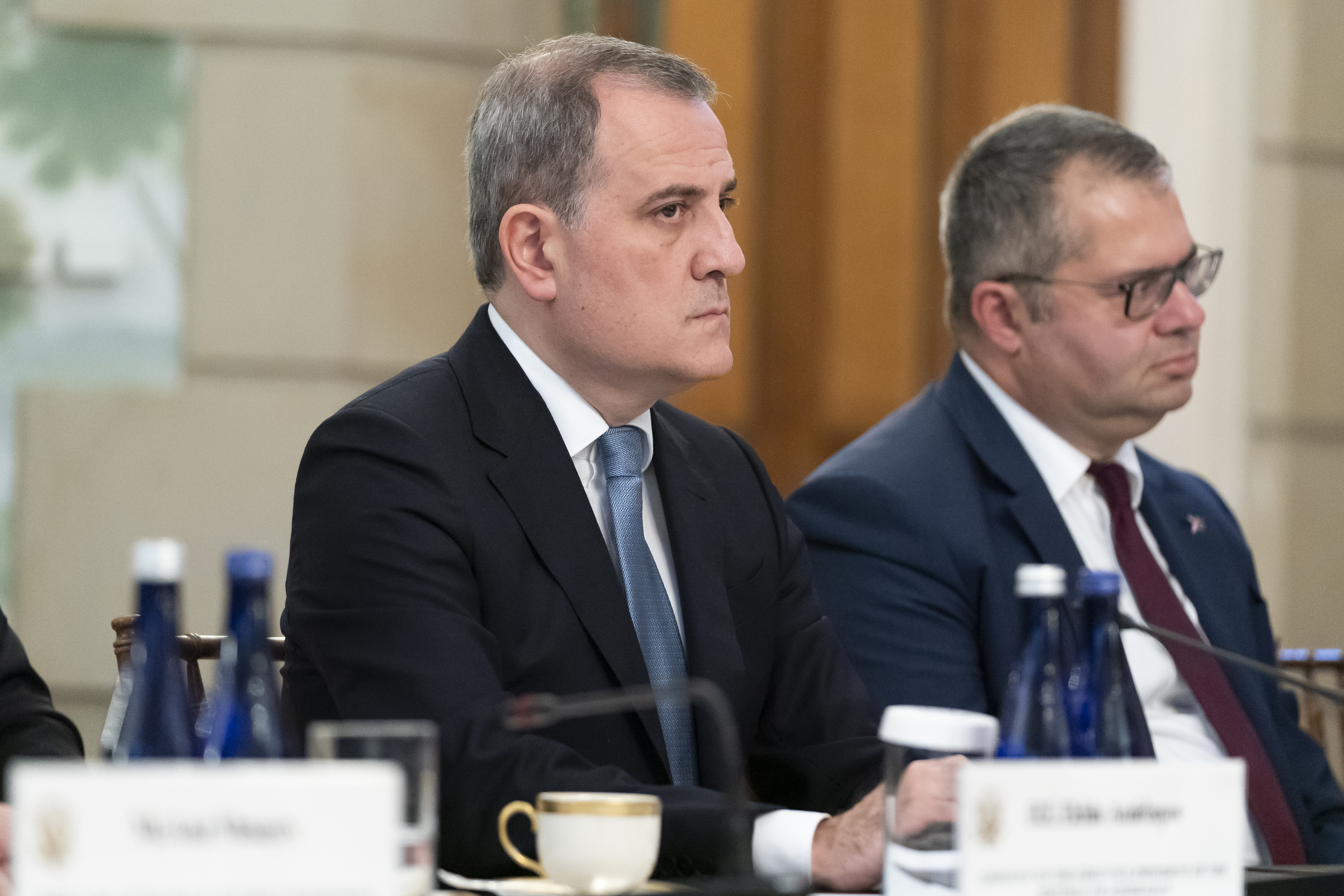Azerbaijan's Foreign Minister Jeyhun Aziz oglu Bayramov, left, listens during a meeting with Secretary of State Antony Blinken and and Armenia's Foreign Minister Ararat Mirzoyan