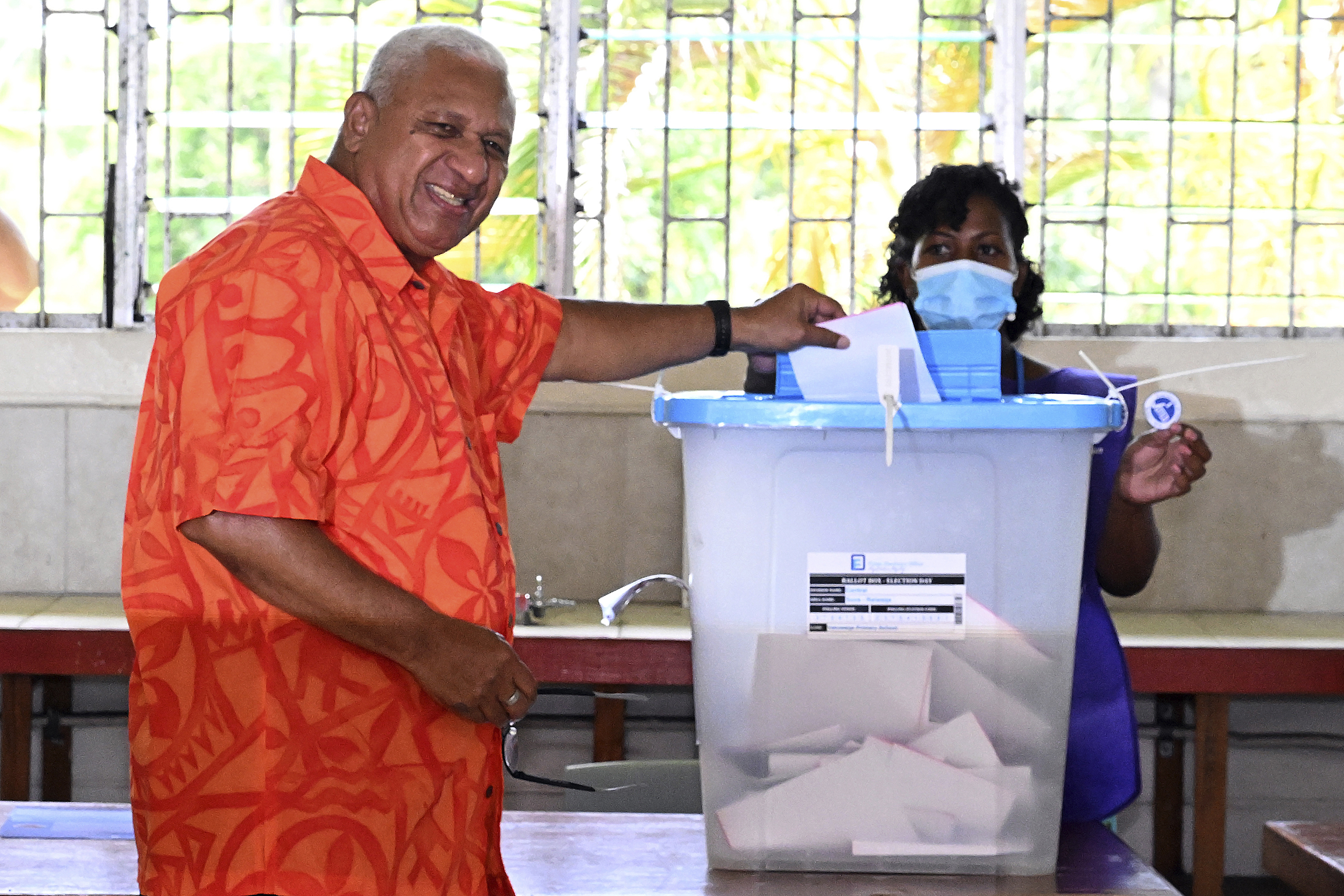 Fiji’s Prime Minister Frank Bainimarama votes the general election in Suva, Fiji, Wednesday, December 14, 2022