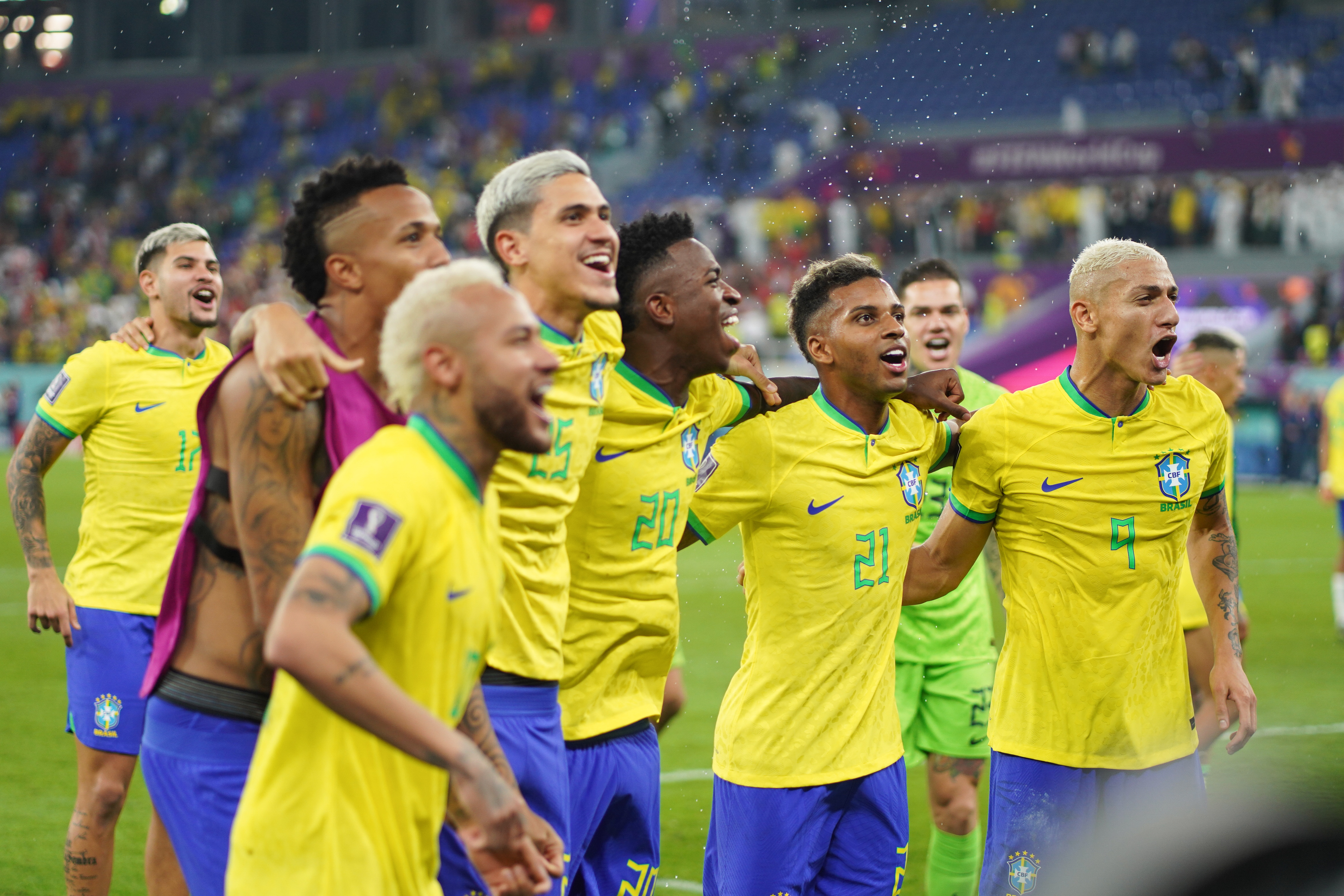Brazil celebrating their victory over South Korea.