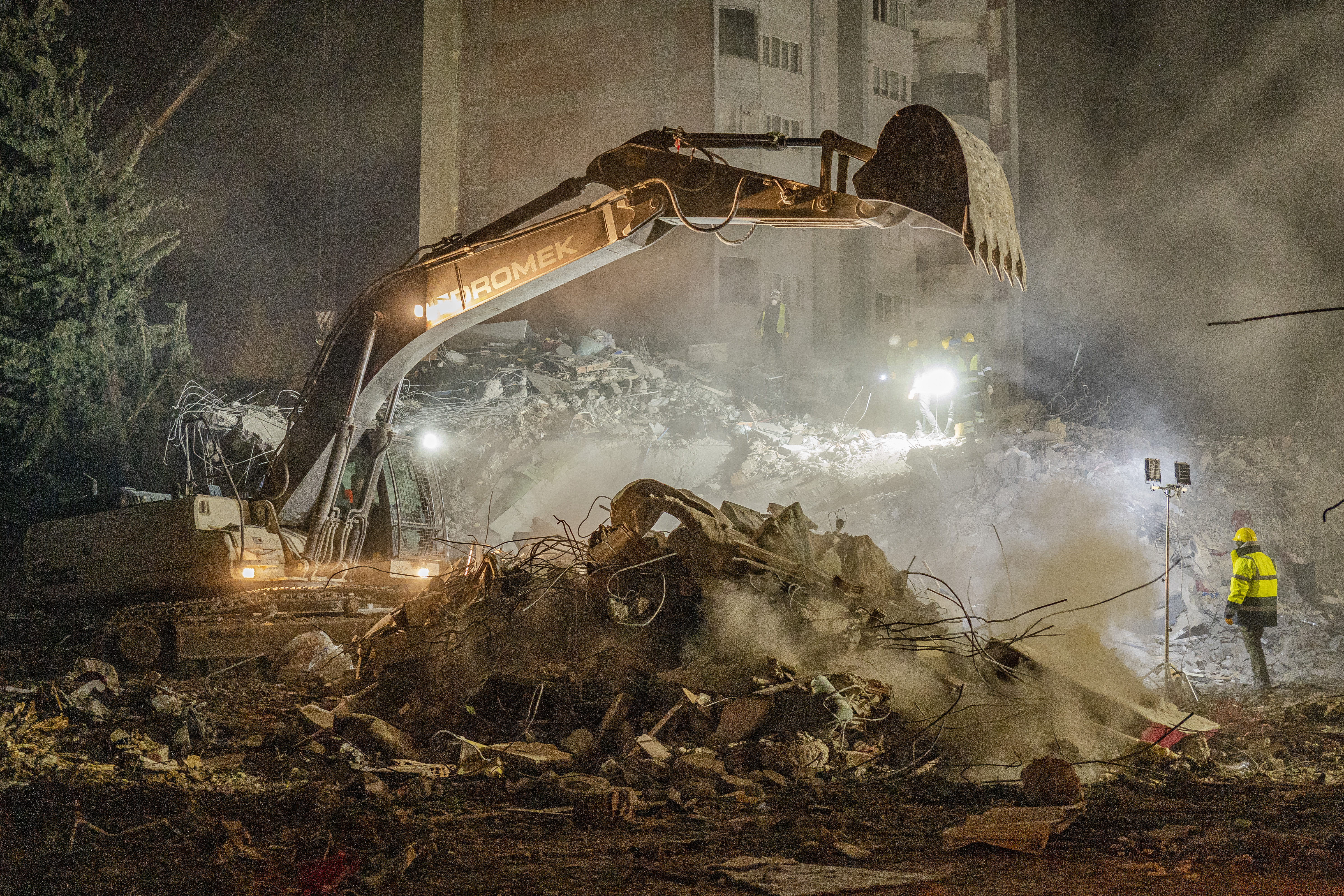 A crane excavates amid the rubbles, a sign that search teams believe there might no longer be survivors beneath the pile of debris.