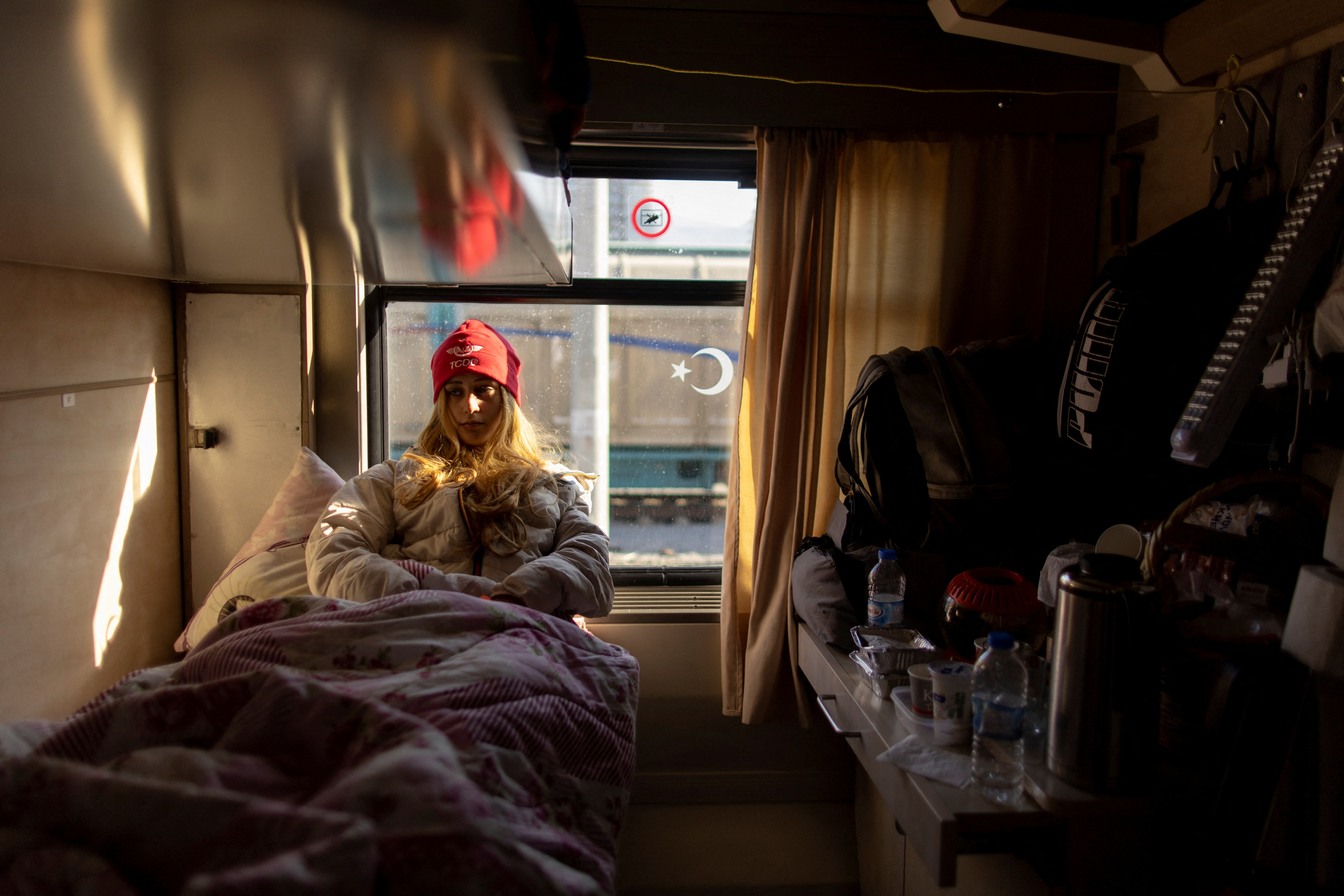 Turkish families shelter on a train after earthquake brought life to a standstill