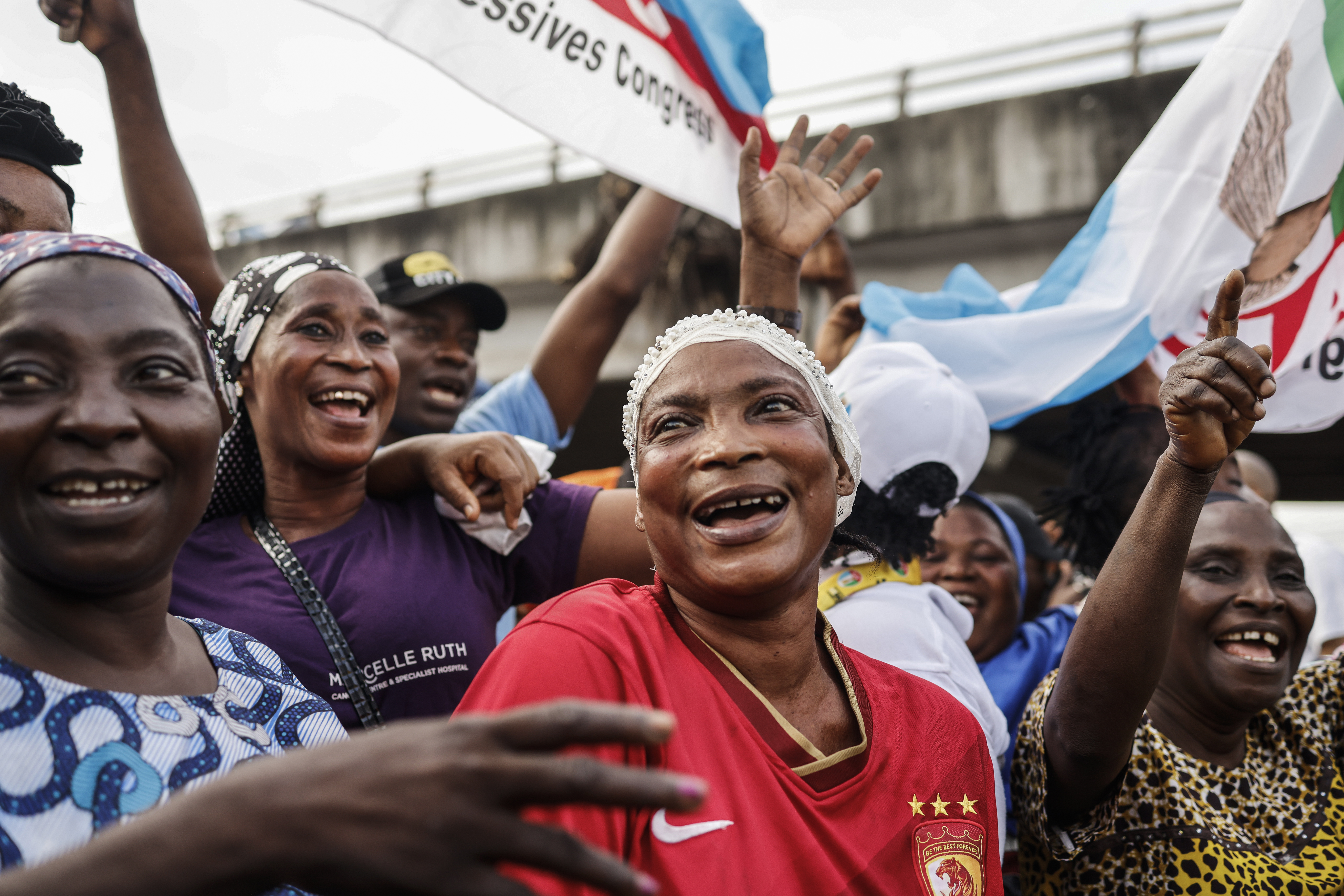 All Progressives Congress (APC) party supporters celebrate in Lagos on March 1, 2023 after party candidate Bola Tinubu won Nigeria's highly disputed weekend election, securing the former Lagos governor his life-long ambition of the presidency of Africa's most populous democracy.
