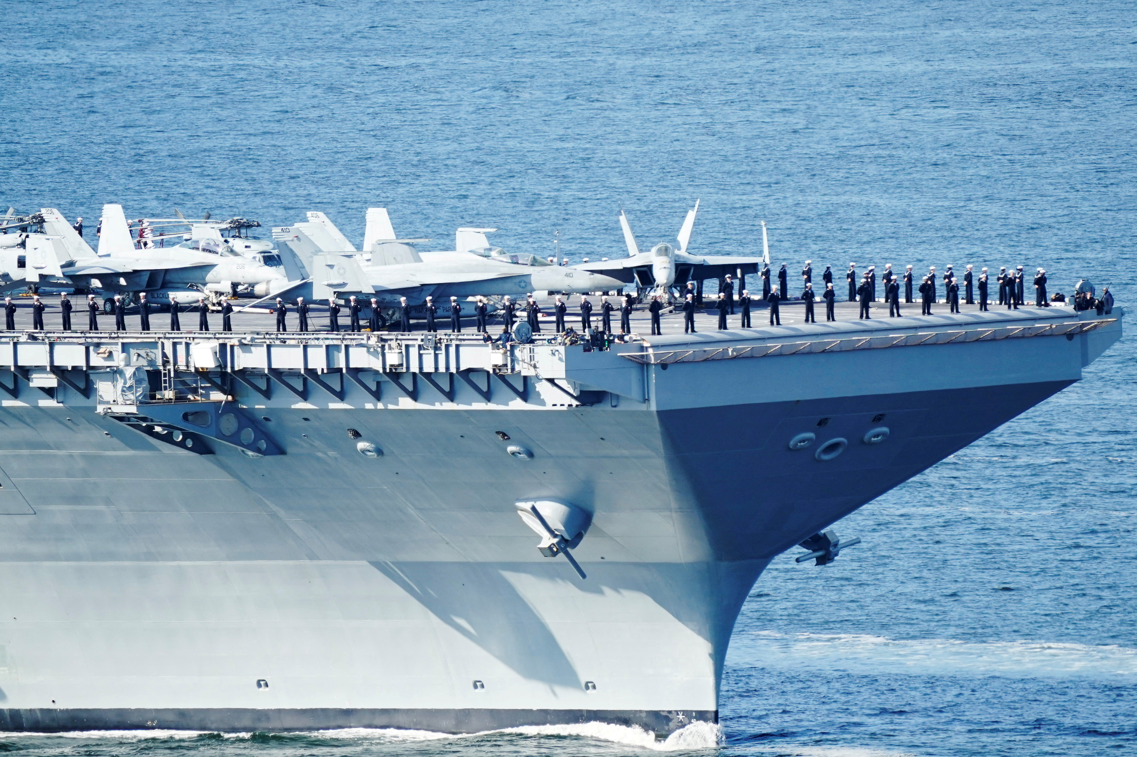 US military members on the USS Gerald R Ford on its way into the Oslo Fjord
