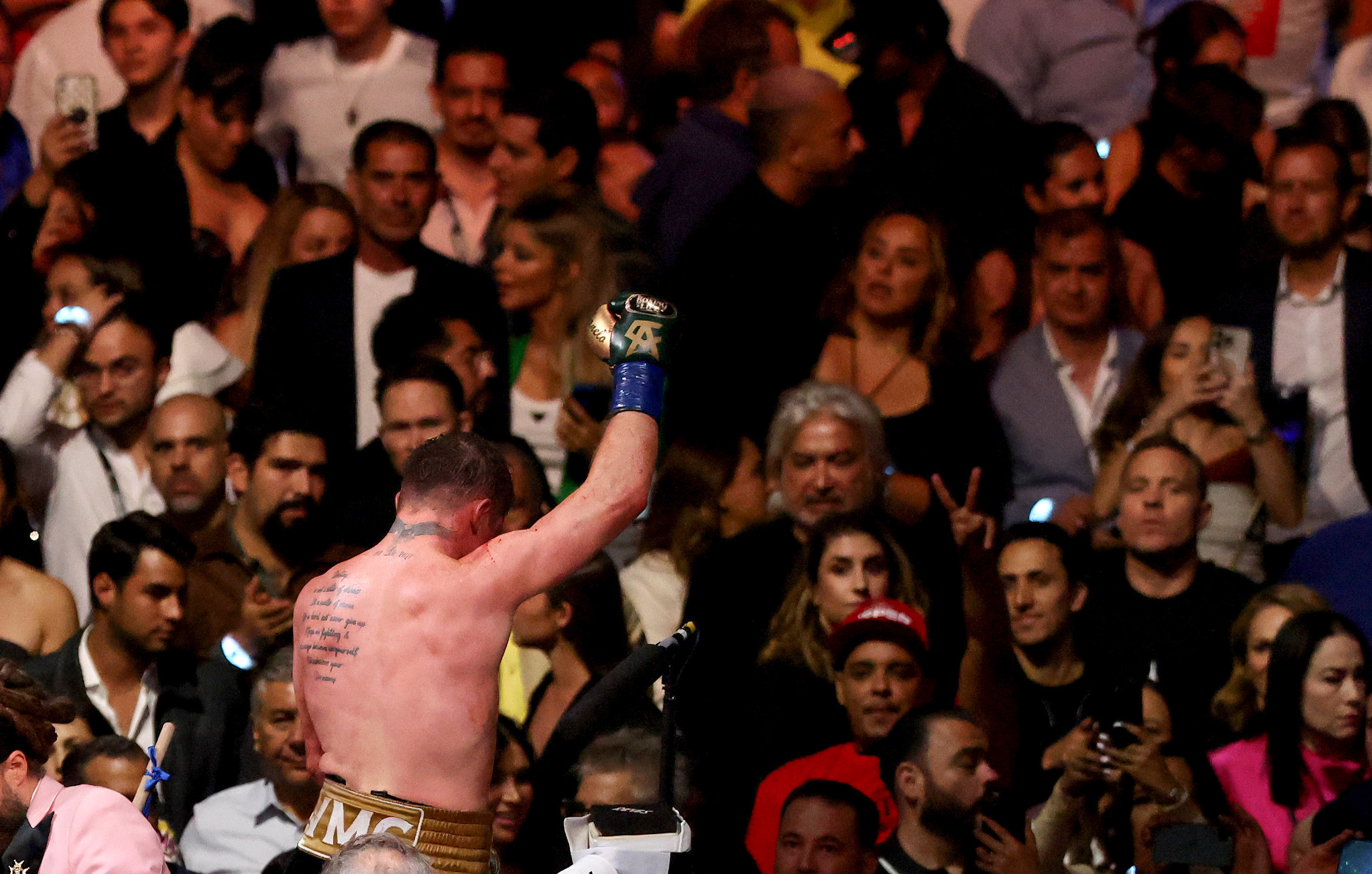 Mexican boxer Saul "Canelo" Alvarez celebrates his win against British boxer John Ryder for the super middleweight world title at Akron Stadium in Guadalajara, Jalisco State, Mexico on May 6, 2023. - Saul "Canelo" Alvarez made a triumphant return to Mexico, punishing John Ryder on the way to a unanimous 12-round decision to retain his undisputed super middleweight world title.
