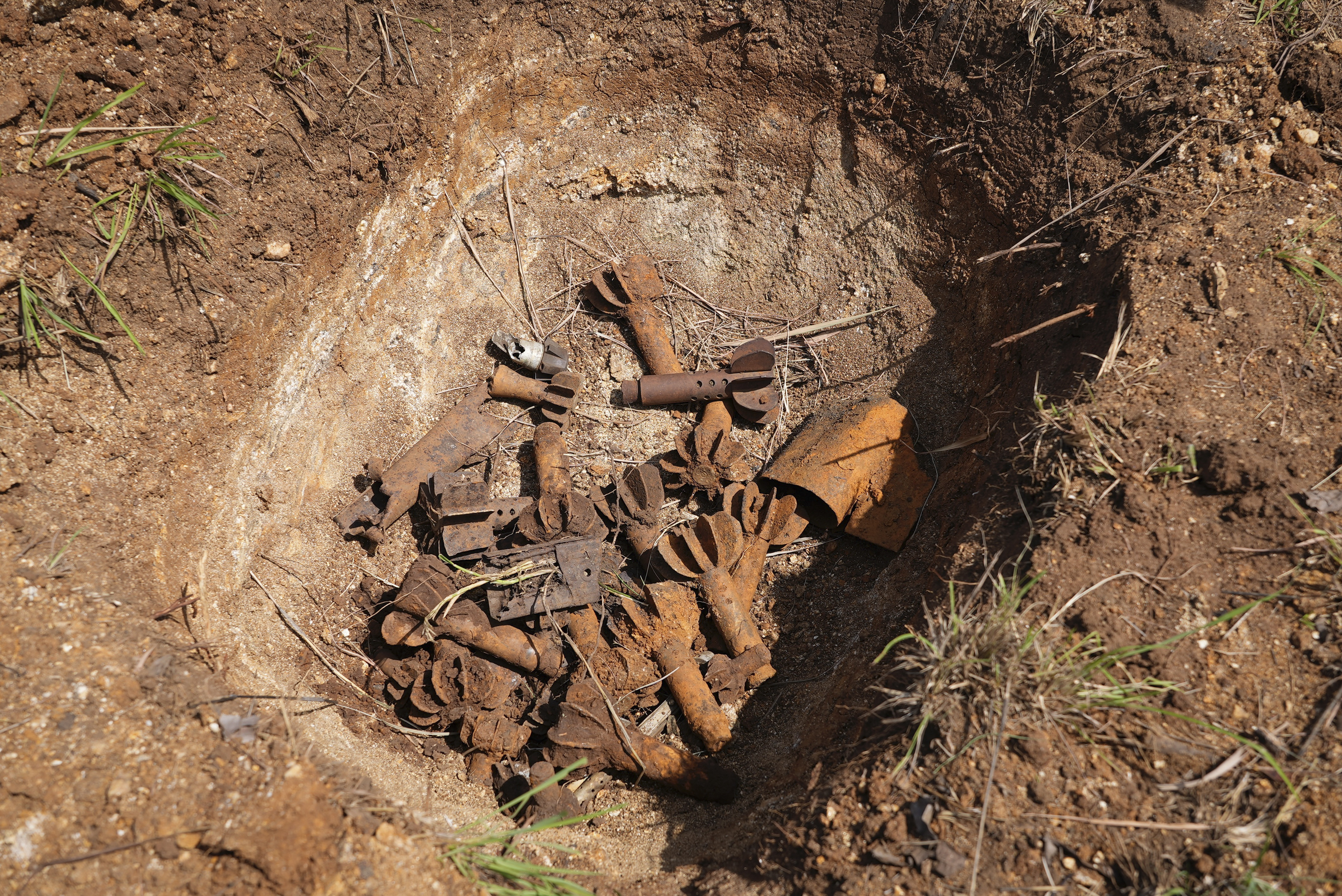 Remnants of cluster munitions at a clearance site in Ayii, Eastern Equatoria state, in South Sudan