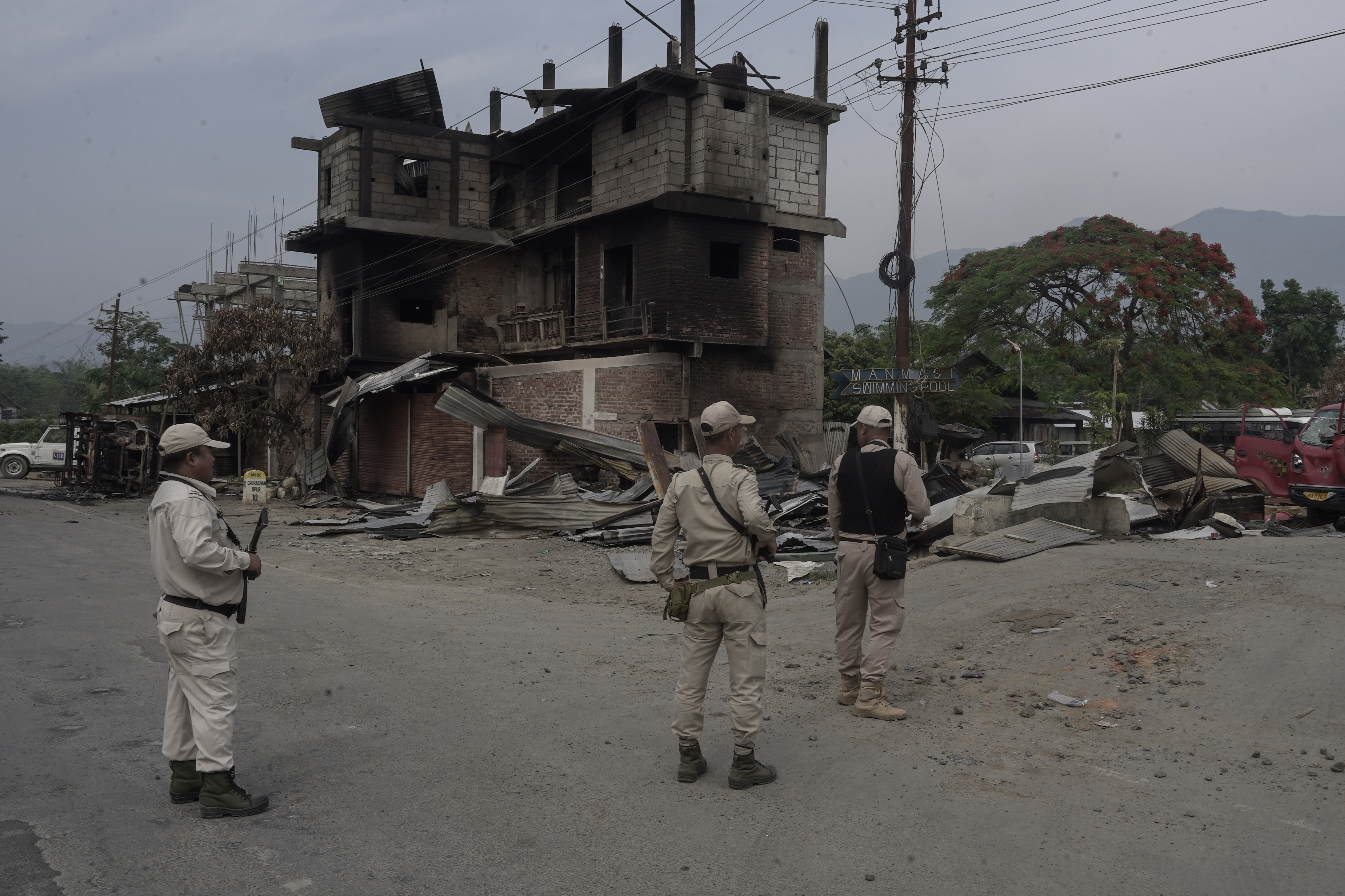 Manipur Police guarding at a checkpoint in the affected Torbung village