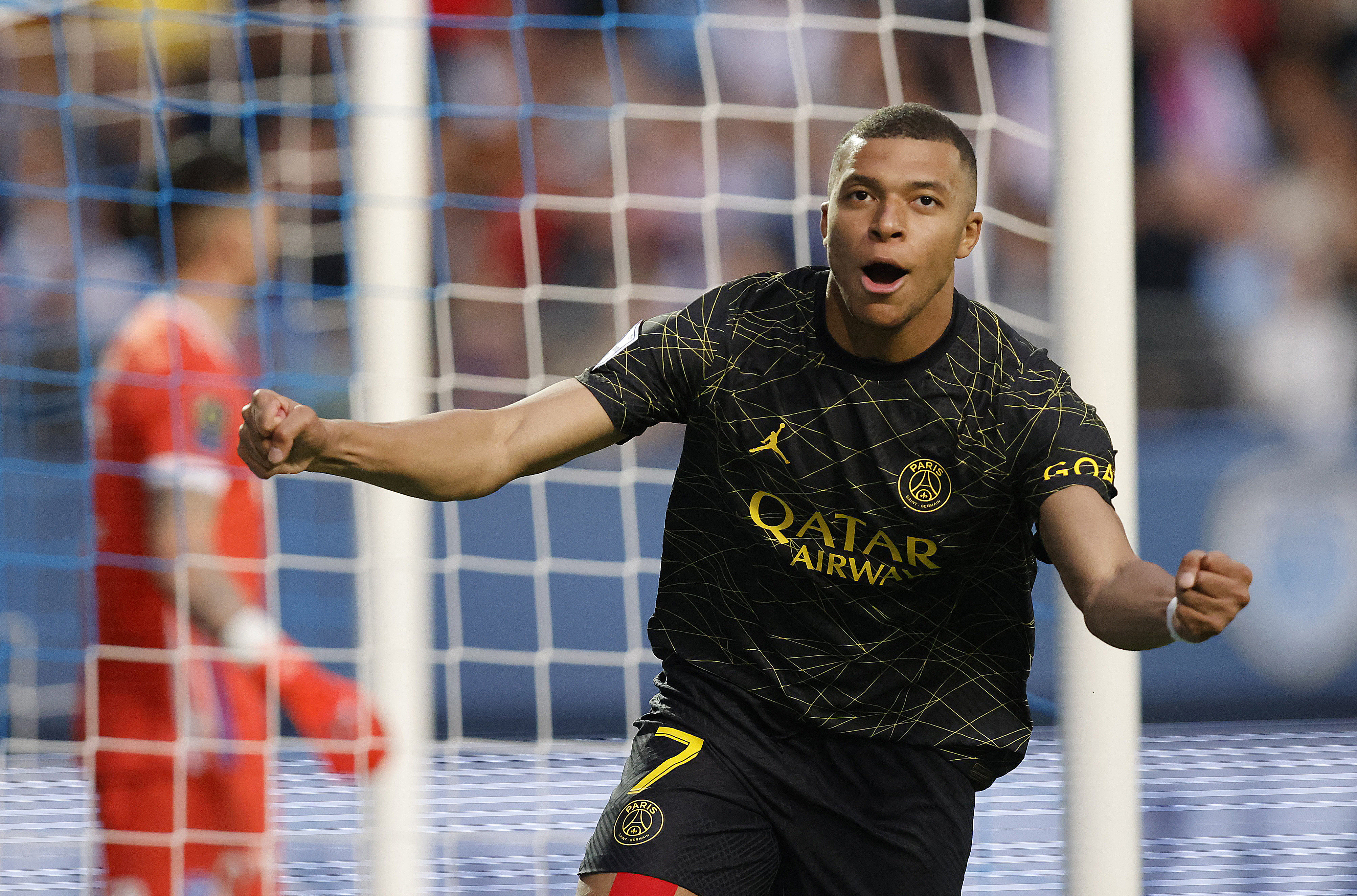 Soccer Football - Ligue 1 - Troyes v Paris St. Germain - Stade de l'Aube, Troyes, France - May 7, 2023 Paris St Germain's Kylian Mbappe celebrates scoring their first goal REUTERS/Johanna Geron