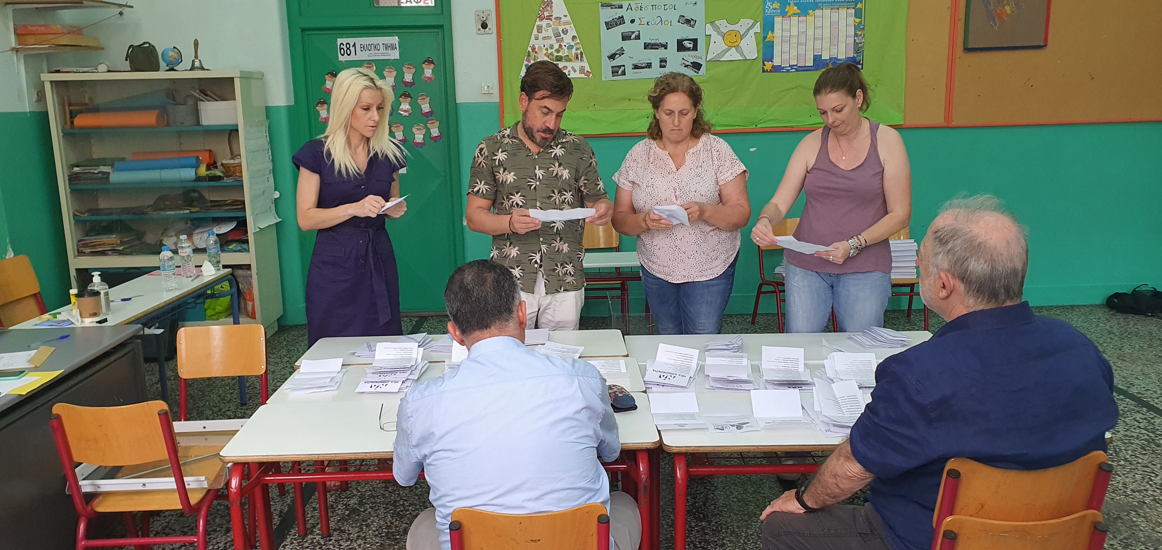 Judicial and party representatives count ballots at Athens’s 681st electoral centre