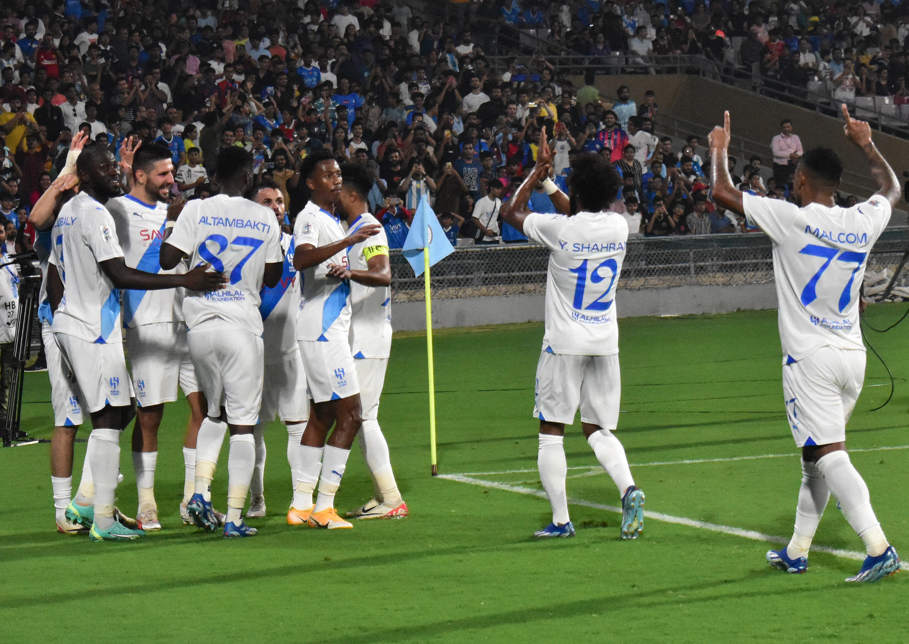 Al-Hilal SFC's players celebrate after scoring a goal during the AFC Champions League 2023/24 Group D football match between India's Mumbai City FC and Saudi Arabias Al-Hilal SFC at the D.Y. Patil stadium in Navi Mumbai on November 6, 2023. (Photo by AFP)