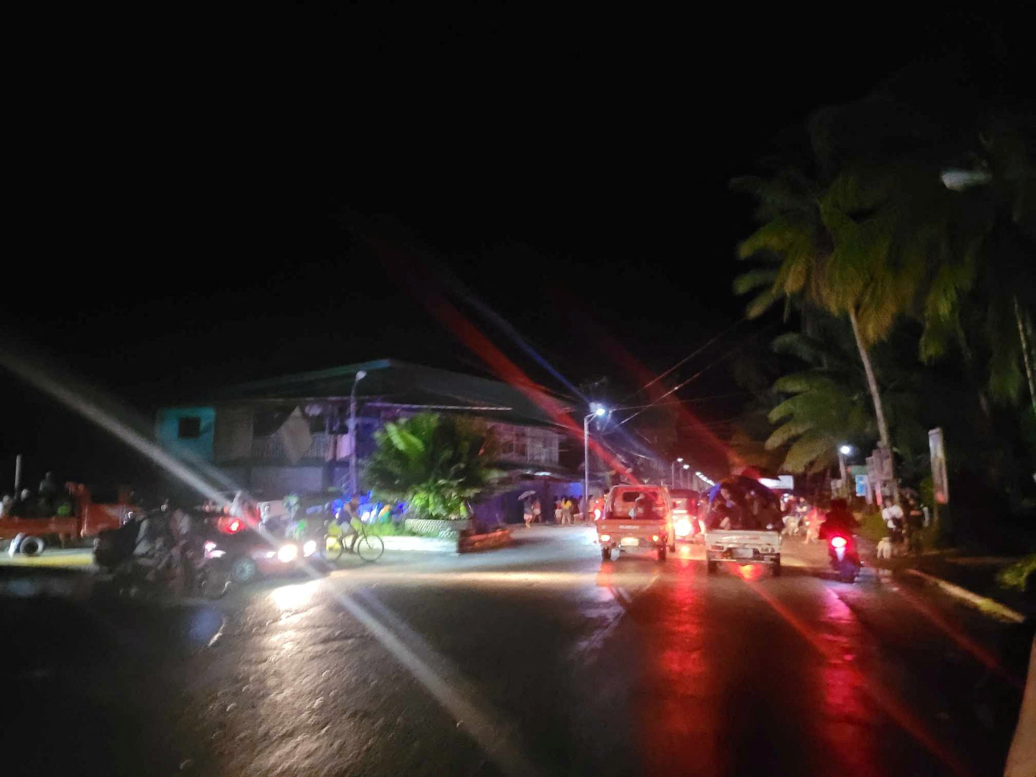 People evacuate following the quake in Surigao del Sur, Philippines