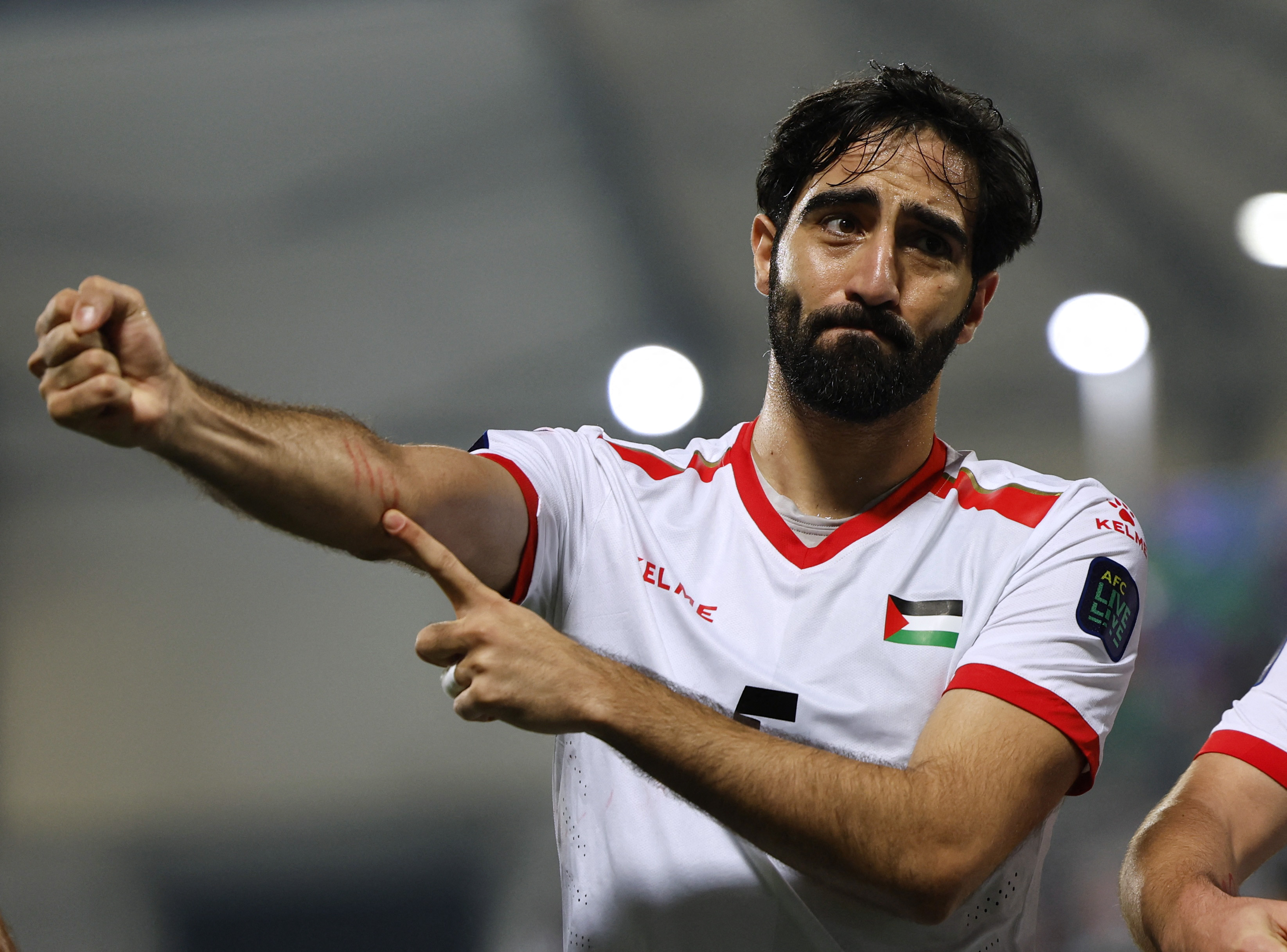 Soccer Football - AFC Asian Cup - Group C - Hong Kong v Palestine - Abdullah bin Khalifa Stadium, Doha, Qatar - January 23, 2024 Palestine's Mohammed Saleh reacts REUTERS/Thaier Al-Sudani