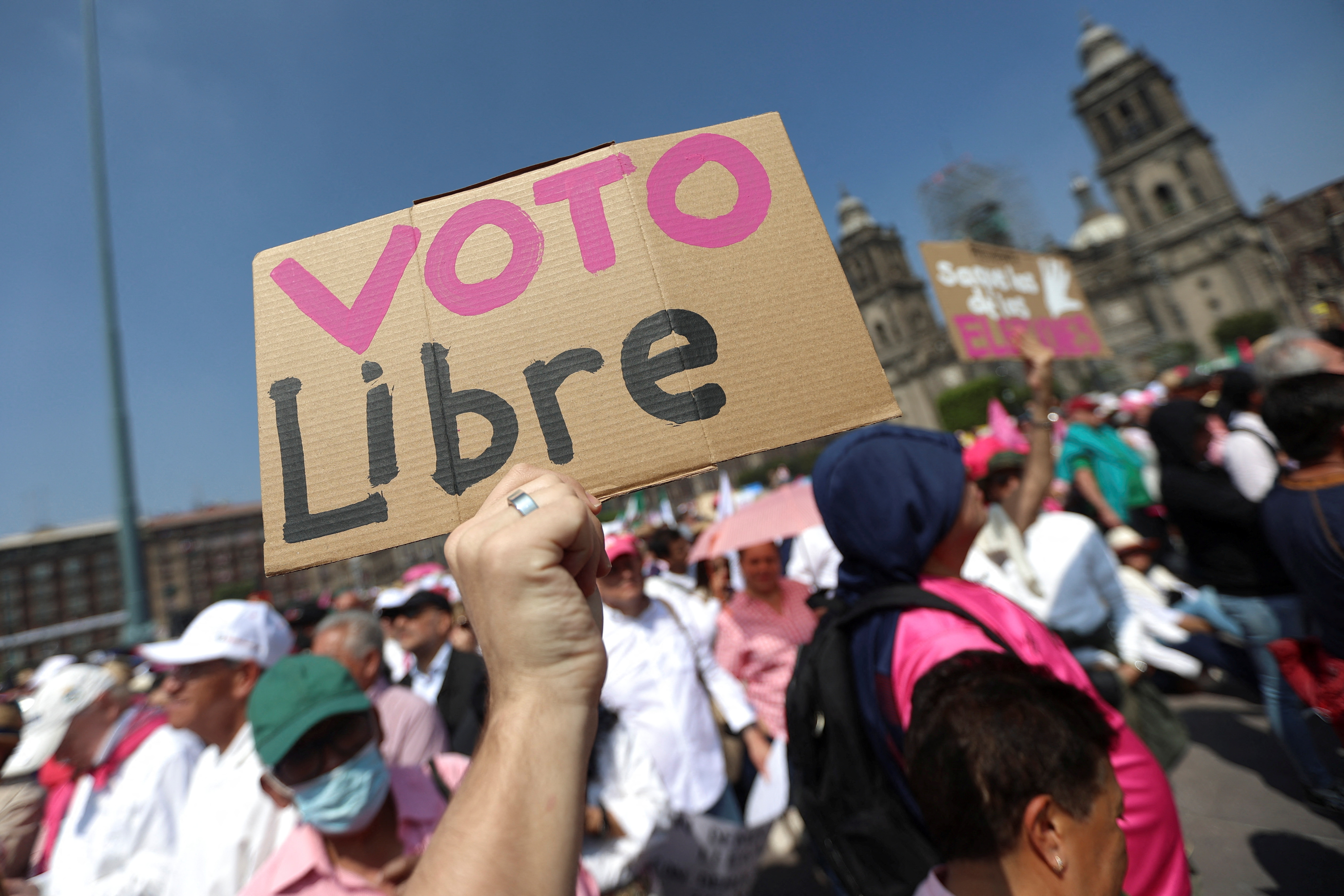 People take parte in a march organized by citizen organizations demanding that electoral autonomy be respected in the upcoming general elections in downtown Mexico City