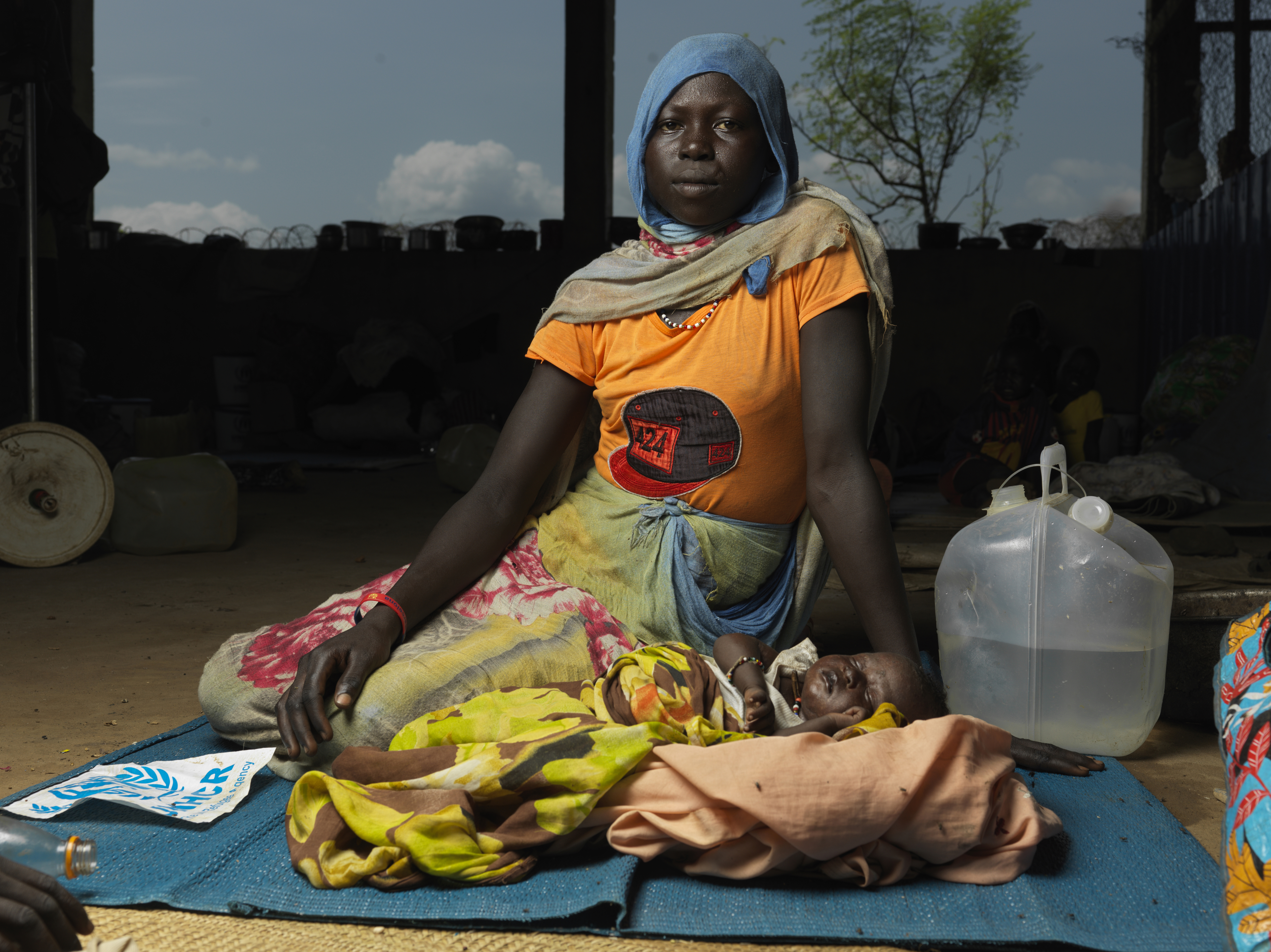Sudanese refugee Ayen Akol with her baby