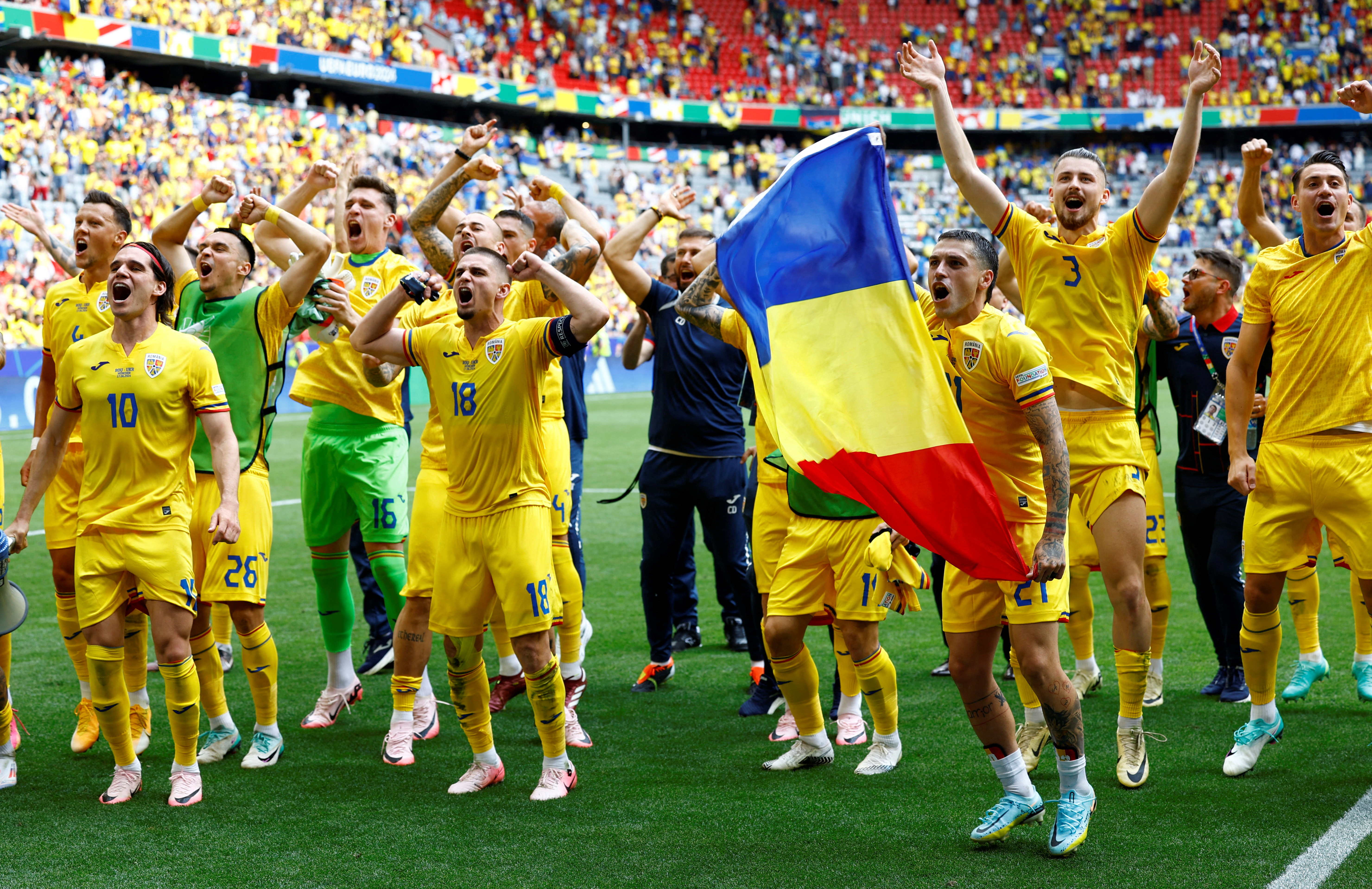 Football players celebrate after win.