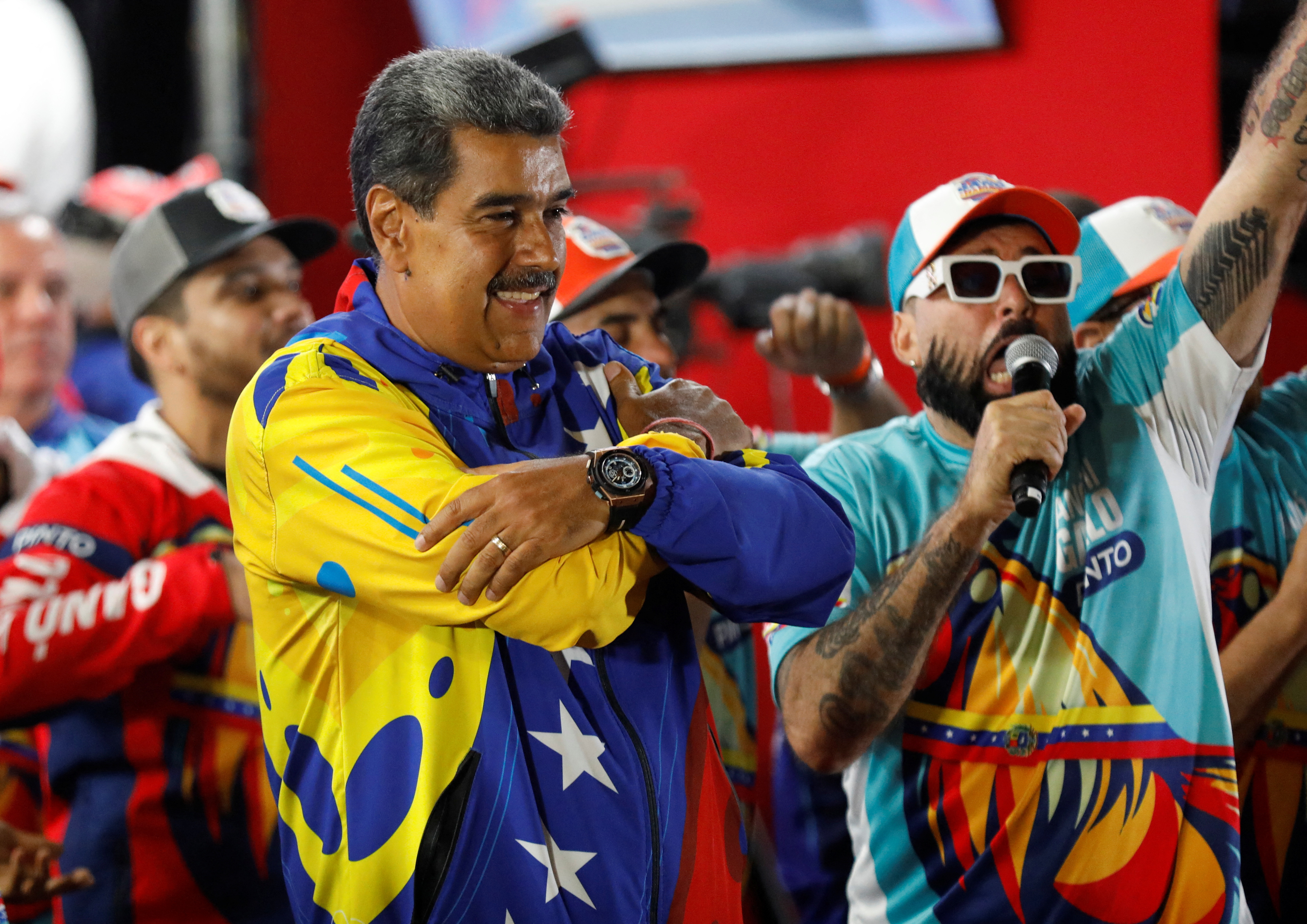 Venezuelan President Nicolas Maduro celebrates after the presidential election in Caracas