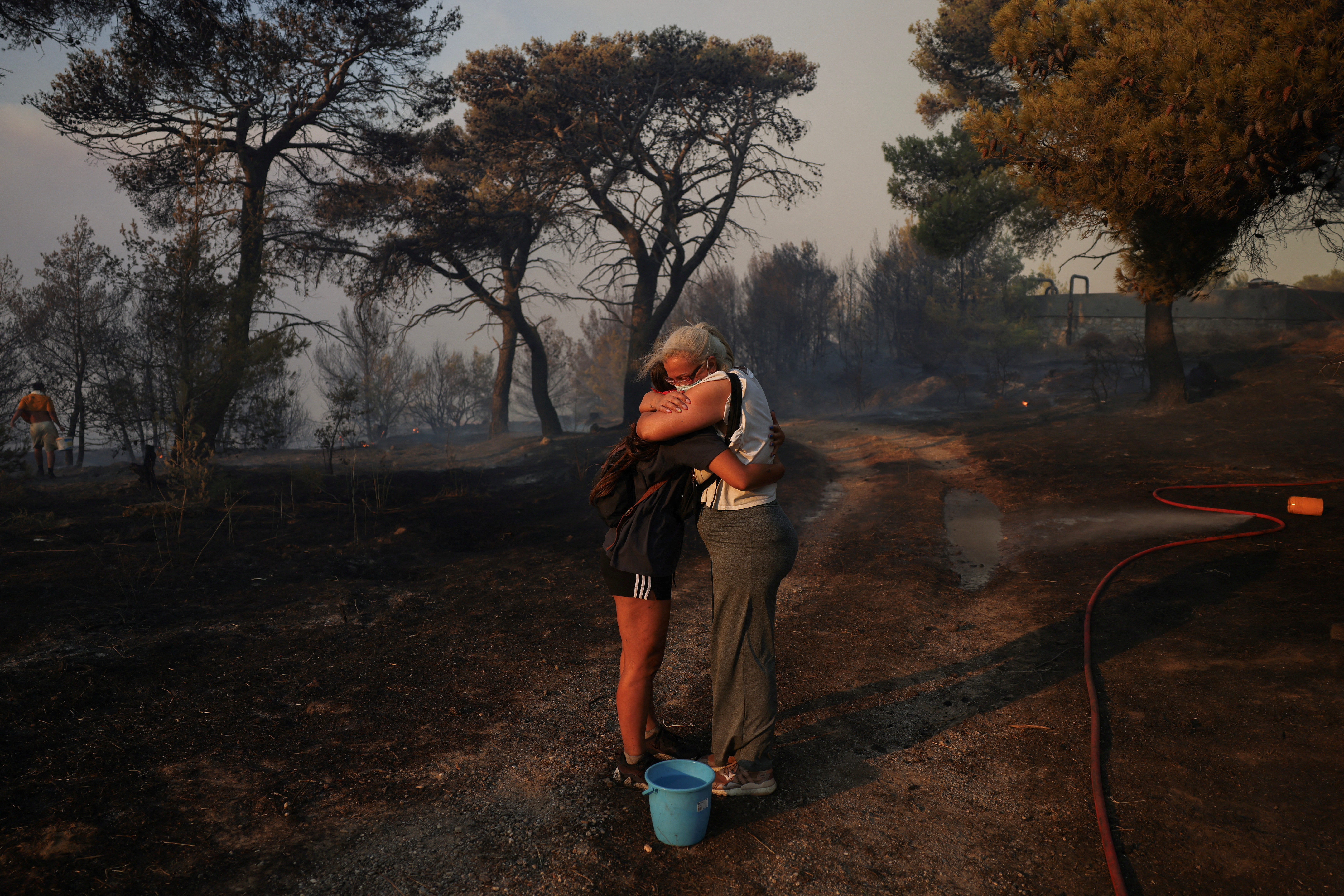 Major wildfire rages out of control on fringes of Greek capital; hundreds of firefighters deployed