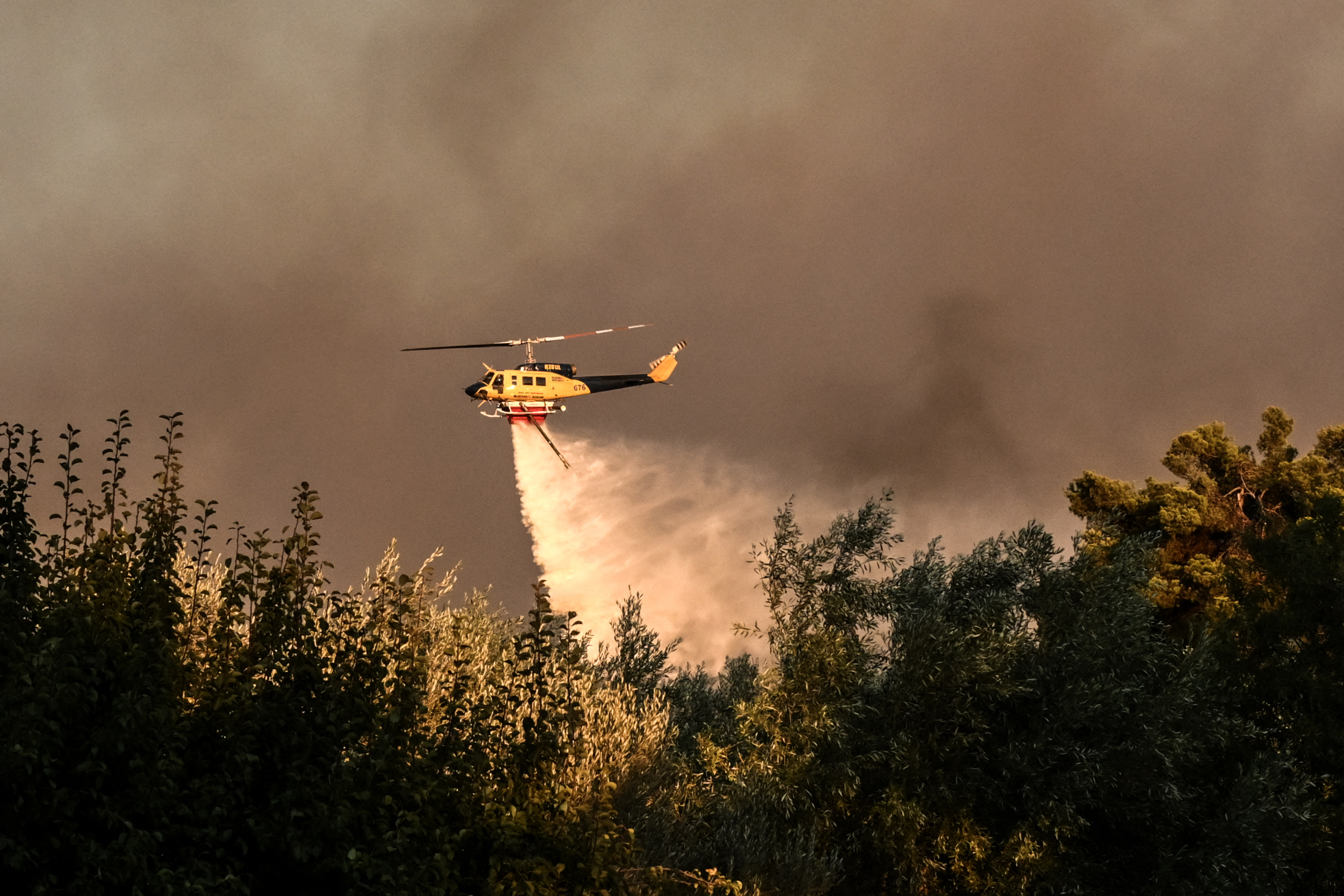 Major wildfire rages out of control on fringes of Greek capital; hundreds of firefighters deployed