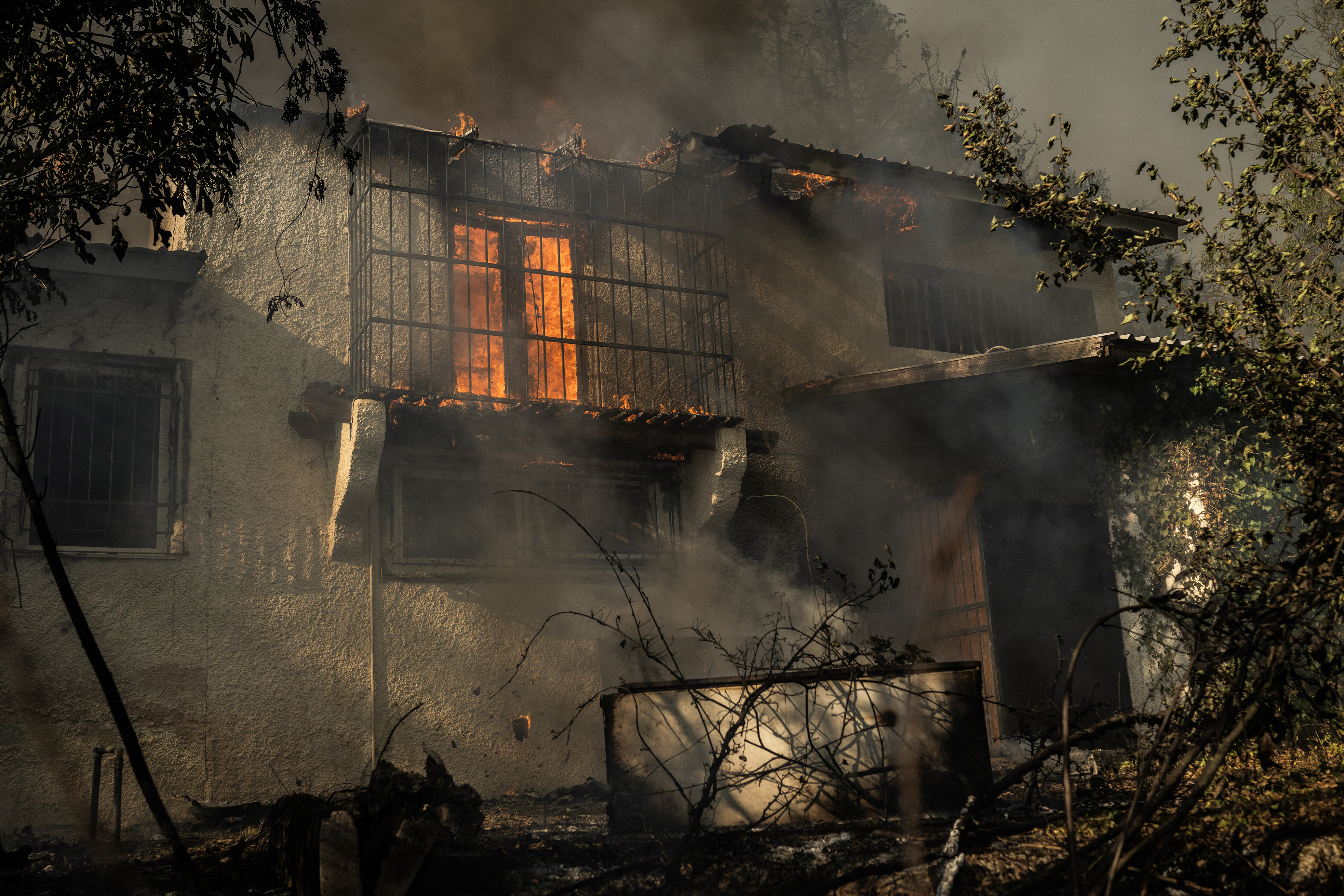 Major wildfire rages out of control on fringes of Greek capital; hundreds of firefighters deployed