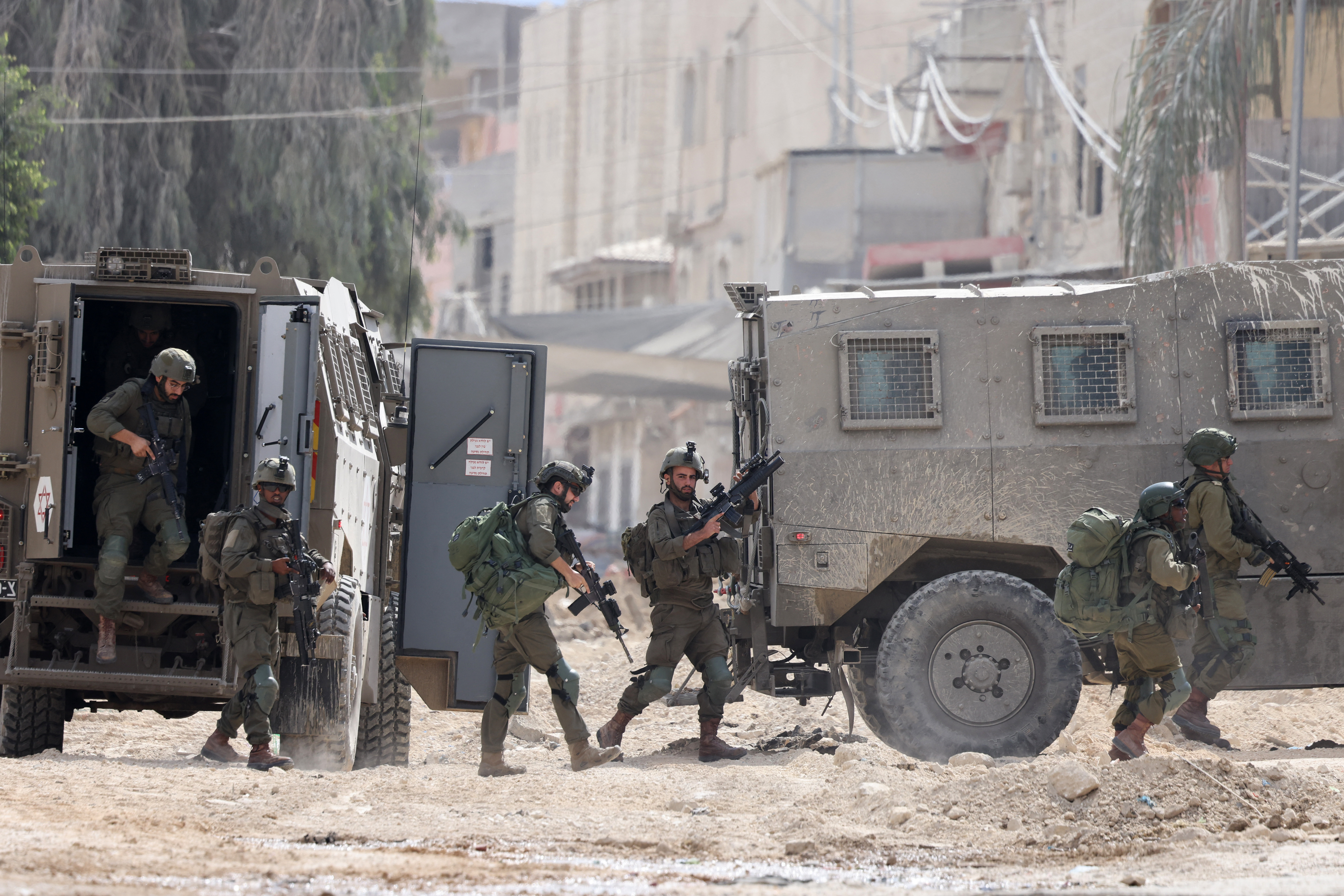 Israeli soldiers raid the Nur Shams camp for Palestinian refugees near the city of Tulkarem in the occupied West Bank. [File: JAAFAR ASHTIYEH/AFP)