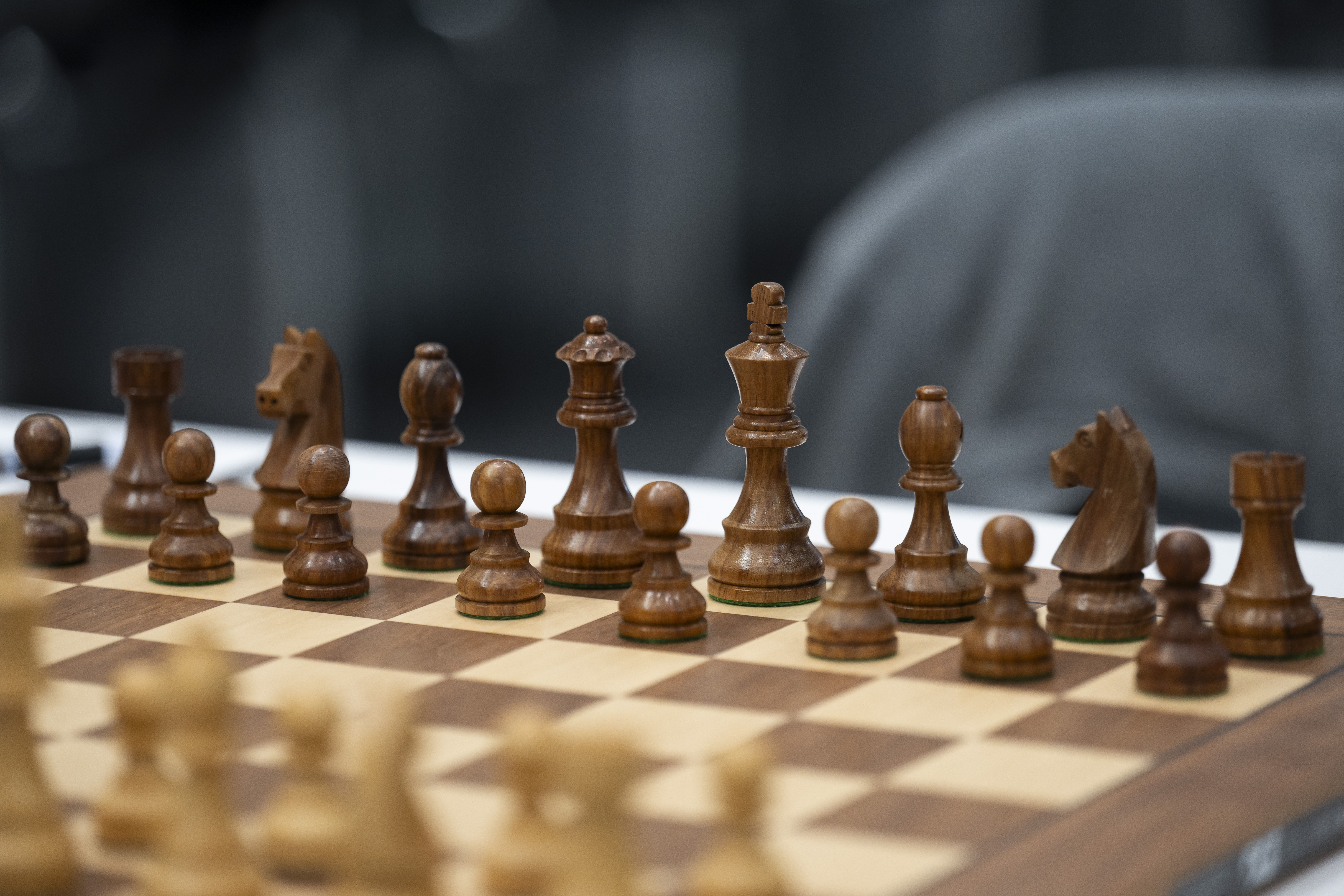 Chess pieces are set up
