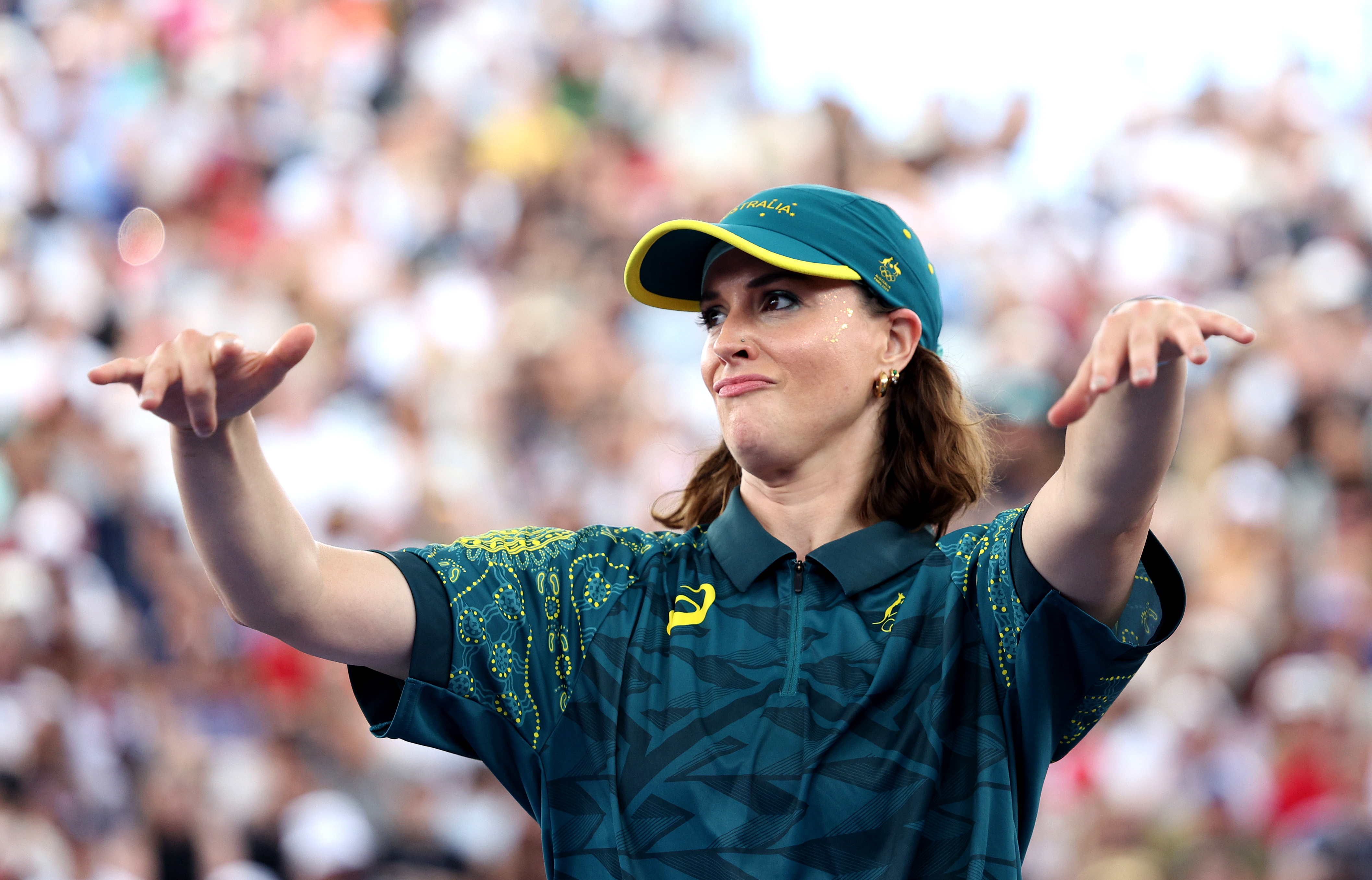 PARIS, FRANCE - AUGUST 09: B-Girl Raygun of Team Australia reacts during the B-Girls Round Robin - Group B on day fourteen of the Olympic Games Paris 2024 at Place de la Concorde on August 09, 2024 in Paris, France. (Photo by Elsa/Getty Images)
