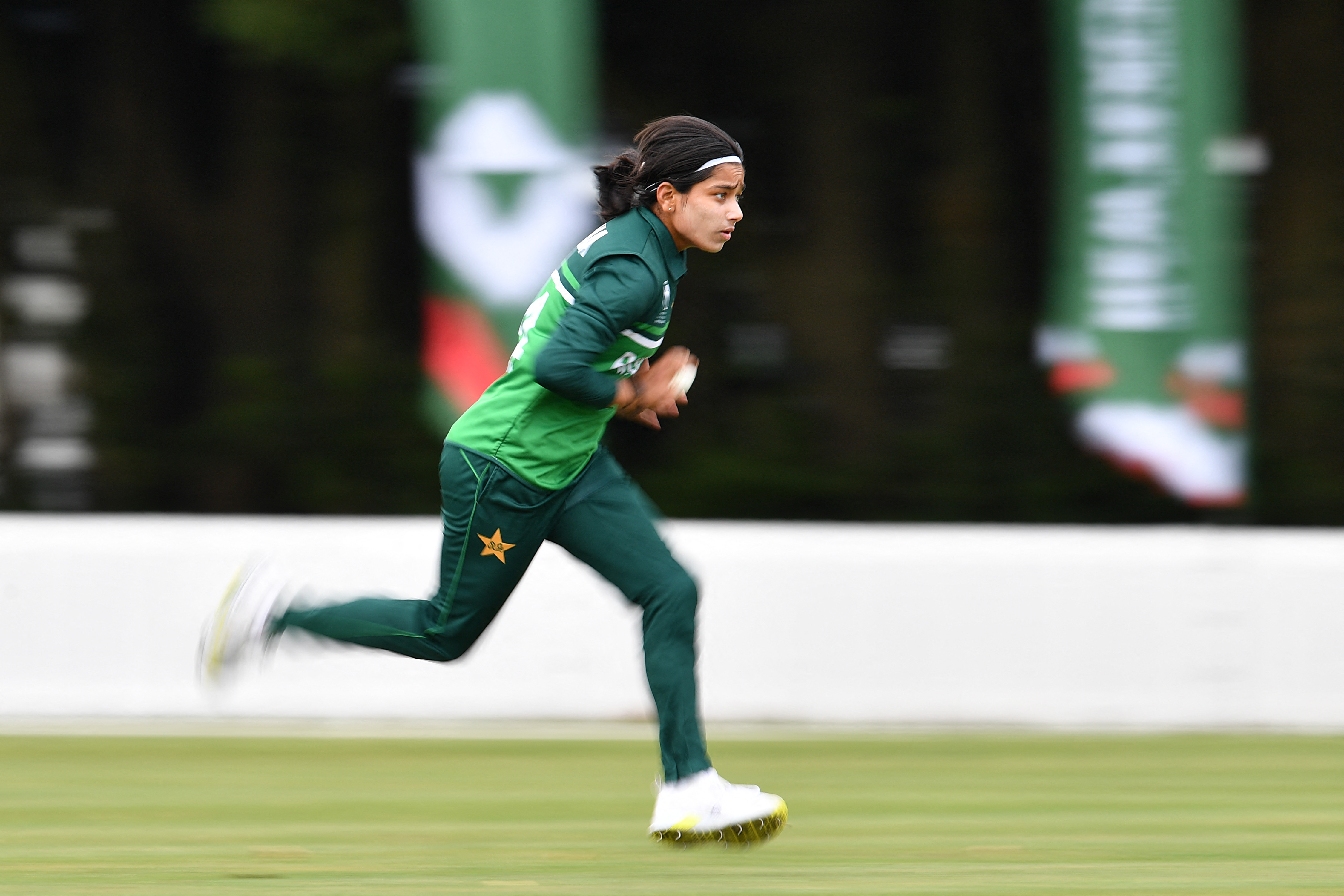 Pakistan's Fatima Sana bowls during the warm-up match between Pakistan and Bangladesh at Lincoln Green in Lincoln on March 2, 2022, ahead of the Women's Cricket World Cup tournament which begins on March 4. (Photo by Sanka Vidanagama / AFP)