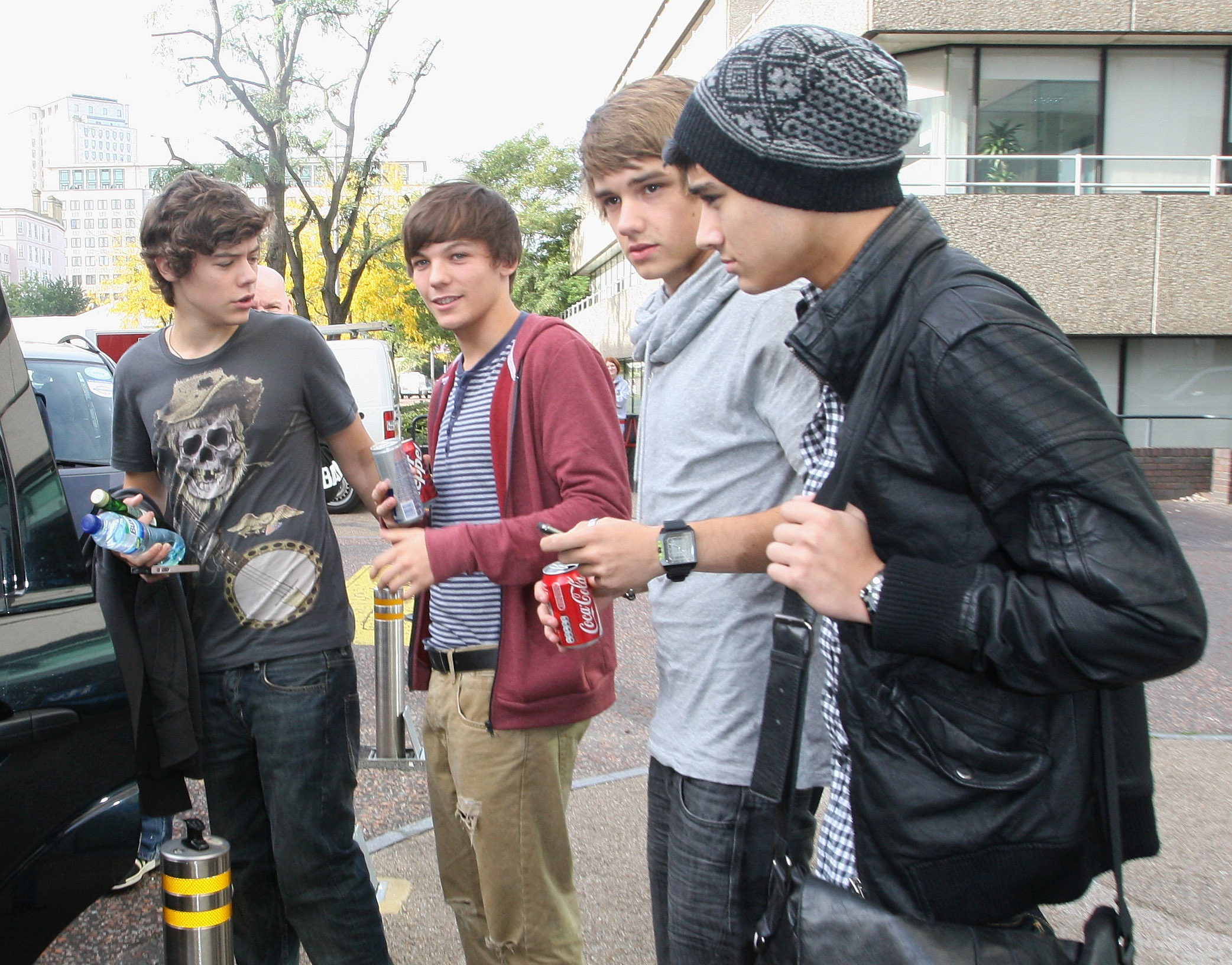 Harry Styles, Liam Payne, Louis Tomlinson and Zayn Malik from Group One Direction X factor finalists are seen leaving ITV Studios on October 7, 2010, in London, UK