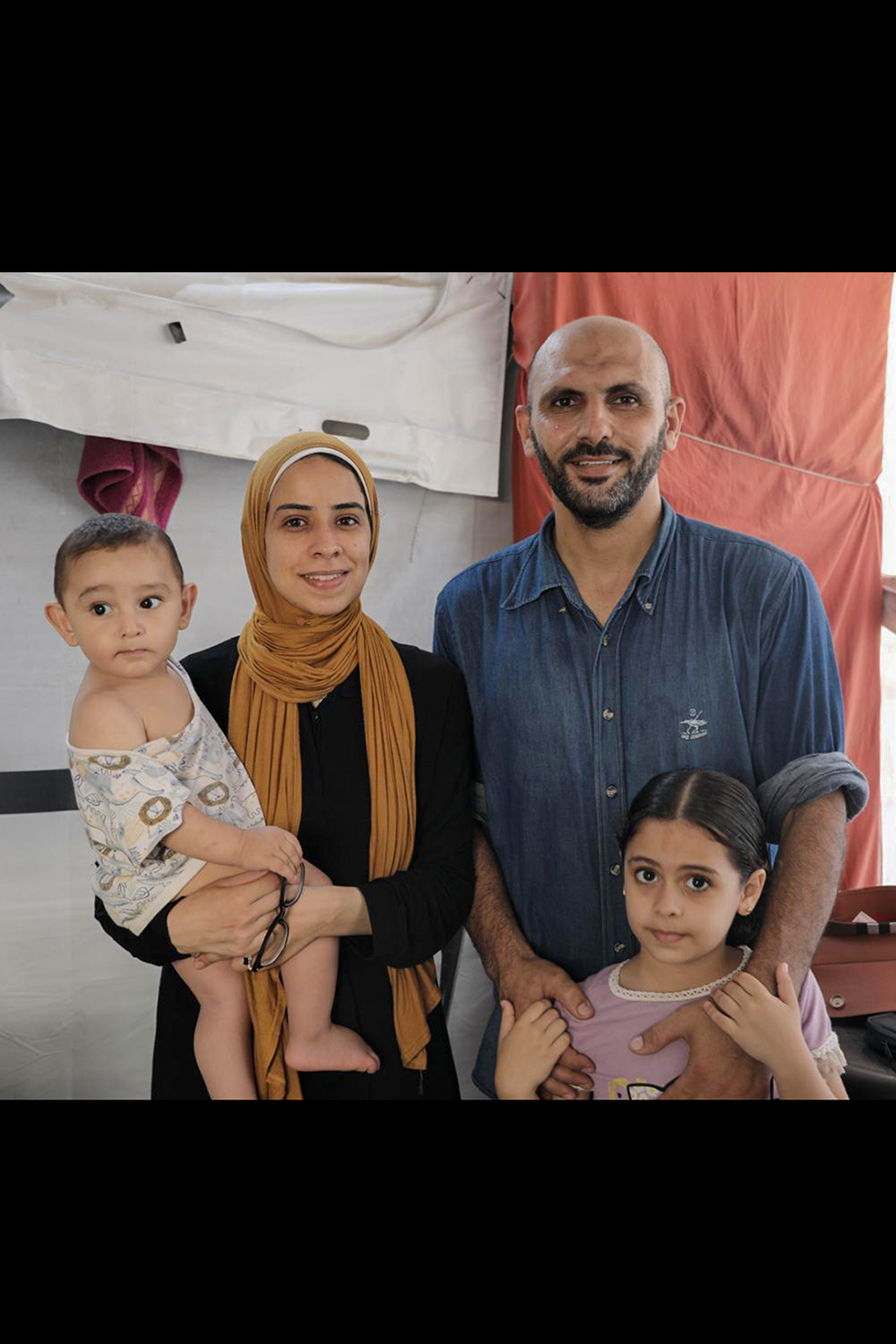 Maram Humaid in Gaza with her husband and children [Maram Humaid/Al Jazeera]