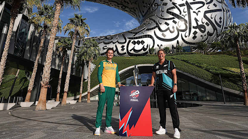 South African captain Laura Wolvaardt and New Zealand's captain Sophie Devine pose with the ICC Women's T20 World Cup 2024 trophy in Dubai