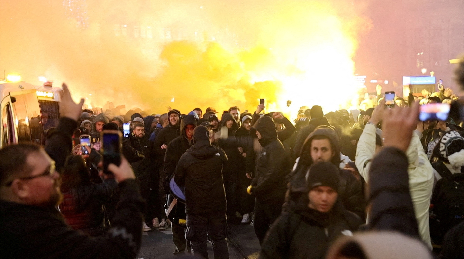 FILE PHOTO: Maccabi Tel Aviv supporters demonstrate and light flares in Amsterdam, Netherlands, November 7, 2024, in this screengrab obtained from a social media video. Michel Van Bergen/via REUTERS/File Photo THIS IMAGE HAS BEEN SUPPLIED BY A THIRD PARTY. MANDATORY CREDIT. REFILE - REMOVING THE NATIONALITY OF THE SOCCER SUPPORTERS AS REUTERS IS UNABLE TO VERIFY THIS INDEPENDENTLY. WE ARE SORRY FOR ANY INCONVENIENCE CAUSED
