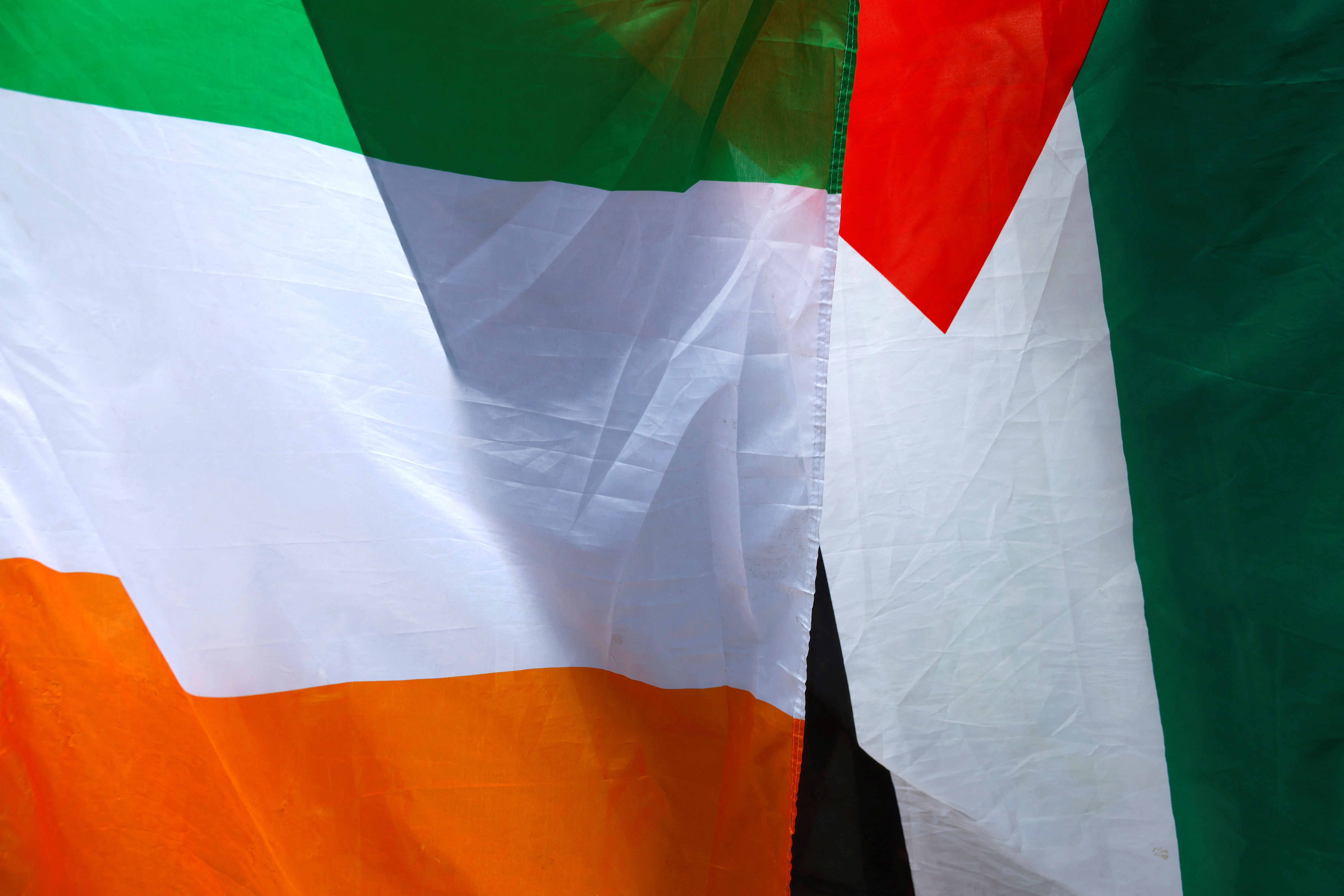 An Irish and a Palestinian flag