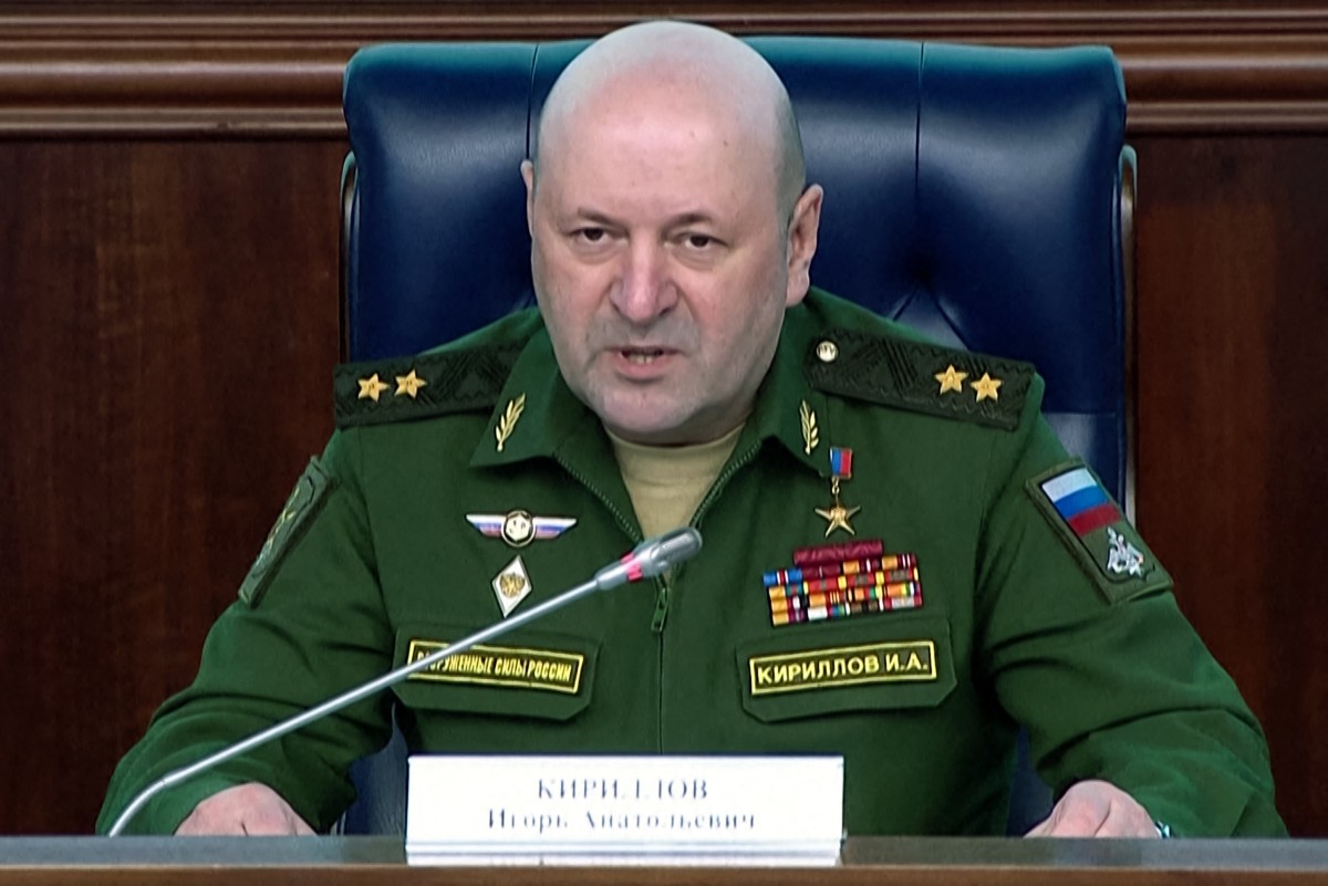In this grab from a handout footage released by the Russian defence ministry on October 24, 2022, Russia’s Lieutenant General Igor Kirillov, in charge of Russian troops for radioactive, chemical and biological protection, is pictured at a briefing in Moscow