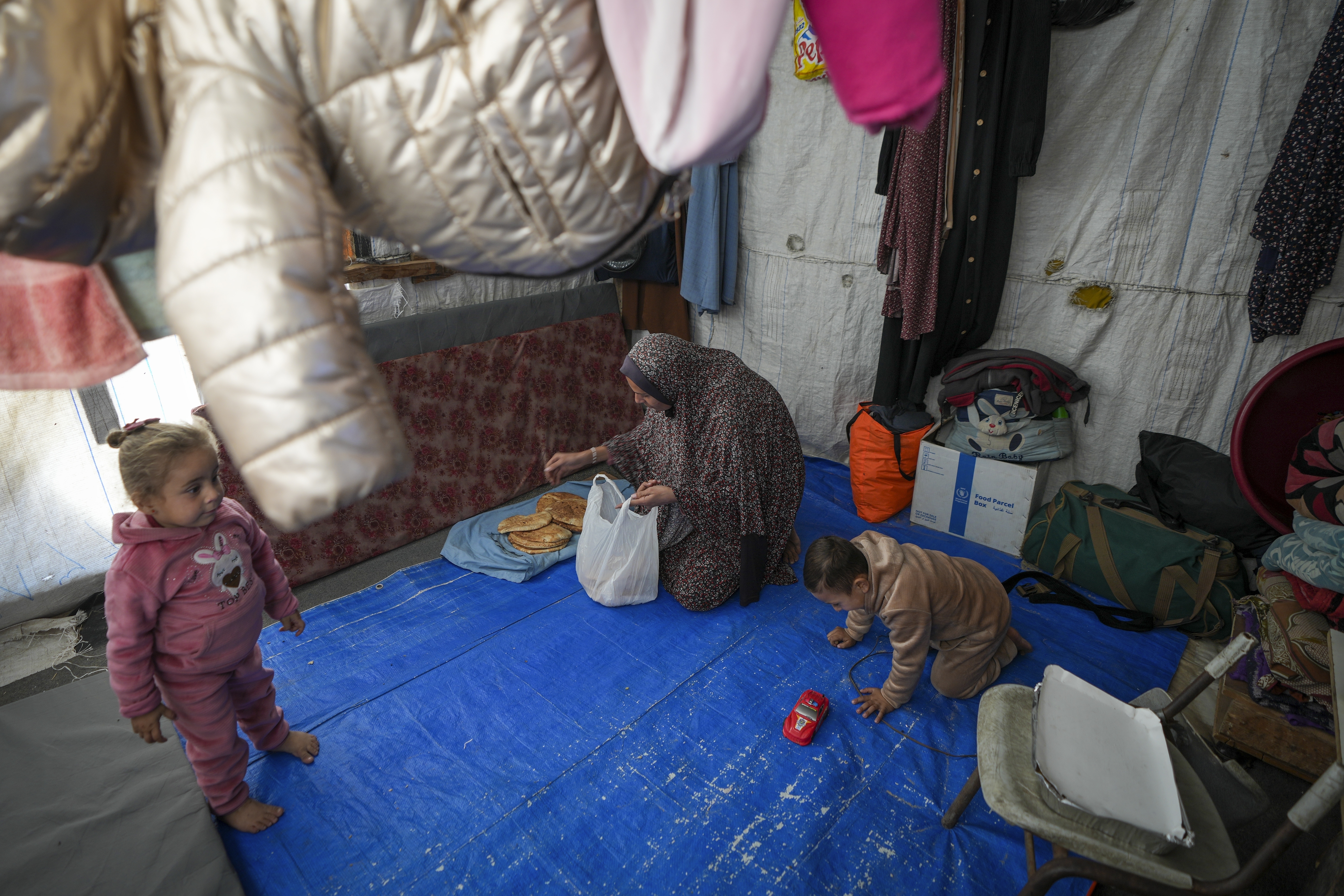 In Gaza's crowded tent camps, women wrestle with a life stripped of privacy
