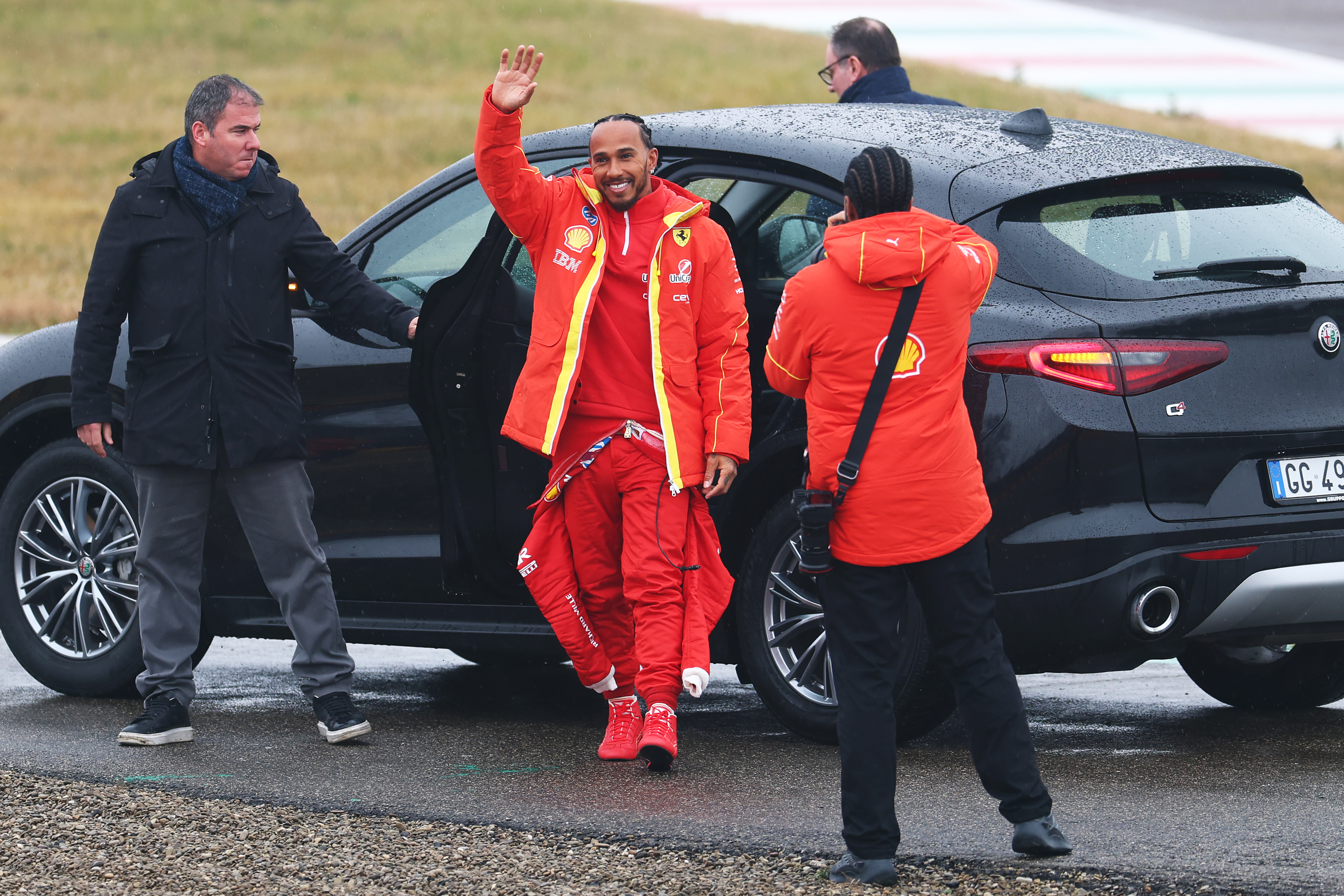 Lewis Hamilton waves to Italian fans.