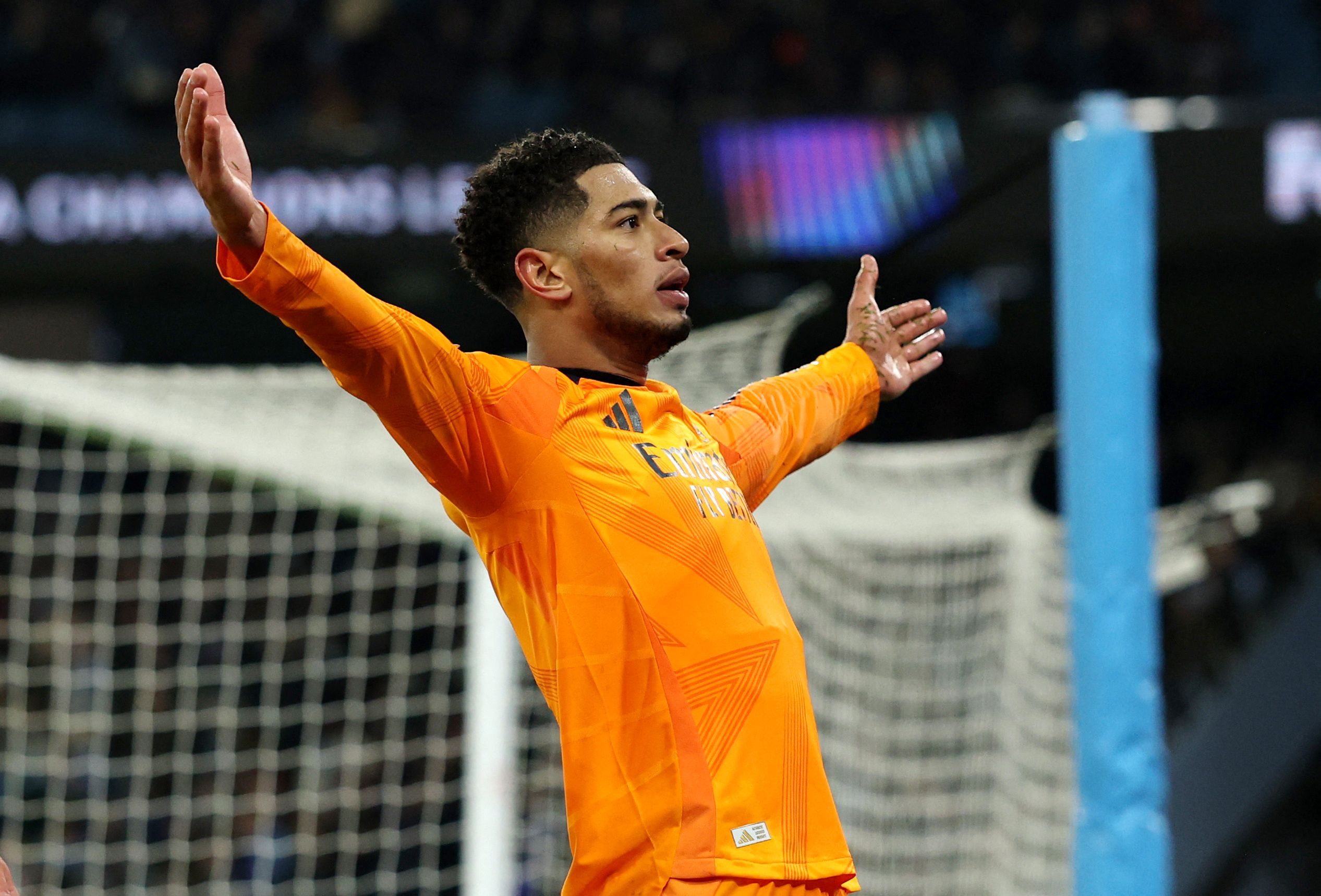 Soccer Football - Champions League - Knockout Phase Playoff - First Leg - Manchester City v Real Madrid - Etihad Stadium, Manchester, Britain - February 11, 2025 Real Madrid's Jude Bellingham celebrates scoring their third goal REUTERS/Phil Noble