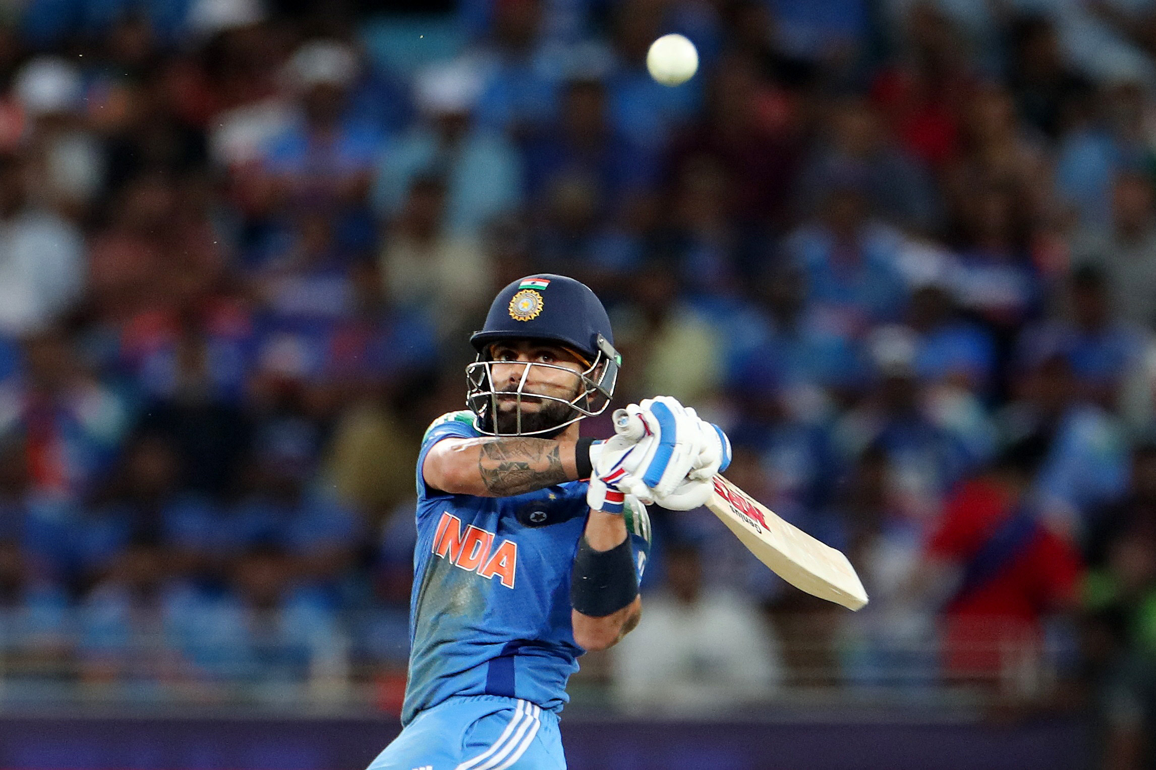 Cricket - ICC Men's Champions Trophy - Group A - India v Pakistan - Dubai International Stadium, Dubai, United Arab Emirates - February 23, 2025 India's Virat Kohli in action REUTERS/Satish Kumar