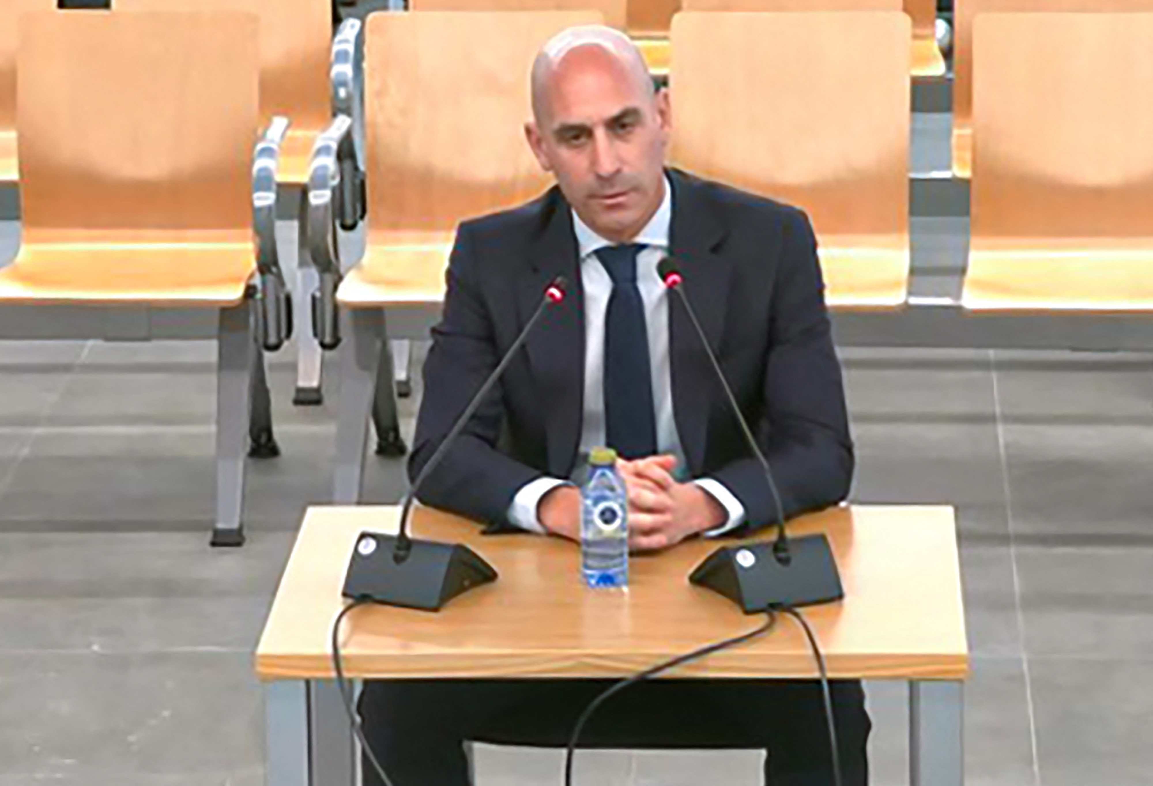 Former Spanish football chief Luis Rubiales reacts.