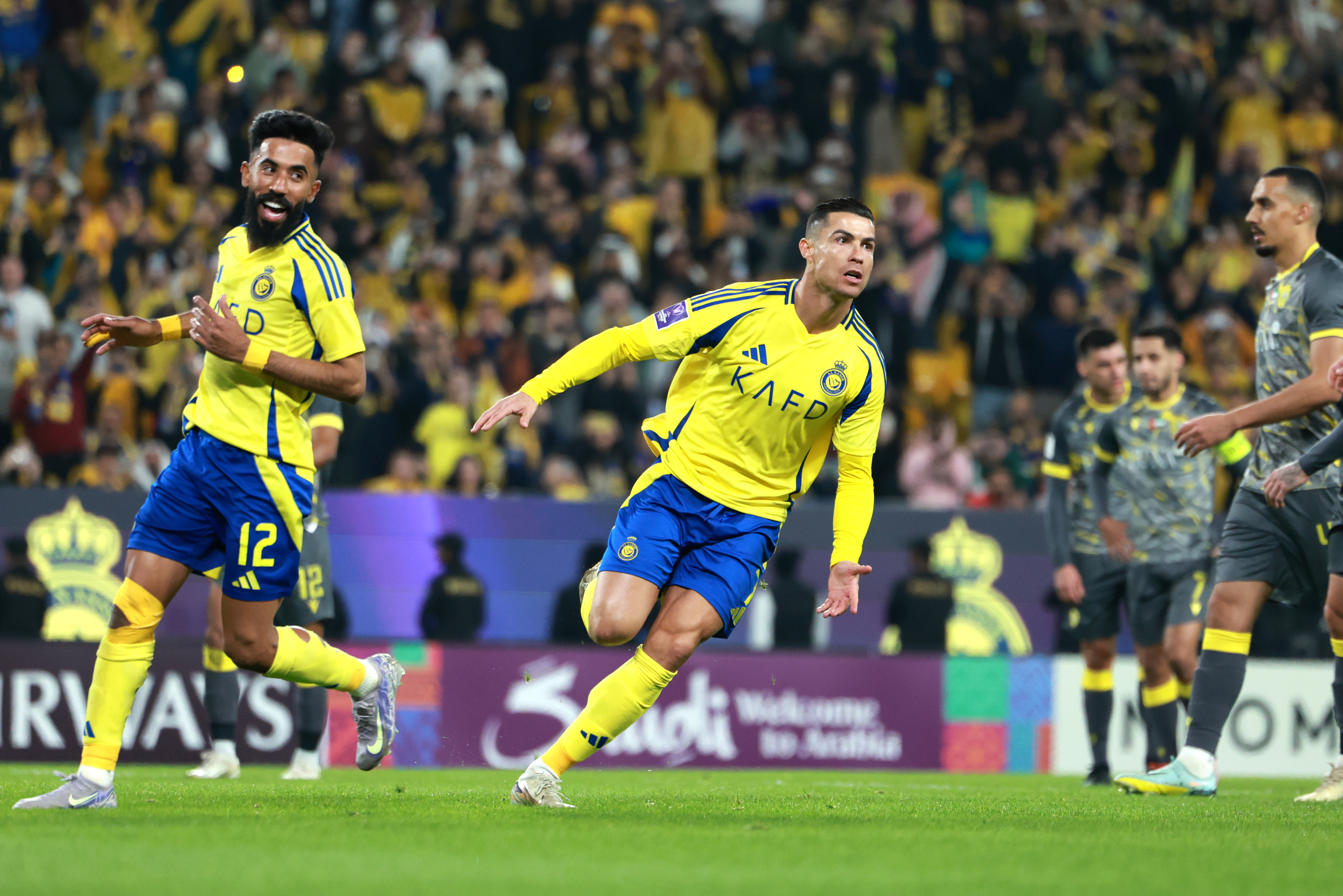Cristiano Ronaldo of Al-Nassr celebrates after scoring his team’s second goal – and his 923rd career goal – during the AFC Champions League Elite match with Al Wasl at King Saud University Stadium on February 3, 2025, in Riyadh, Saudi Arabia