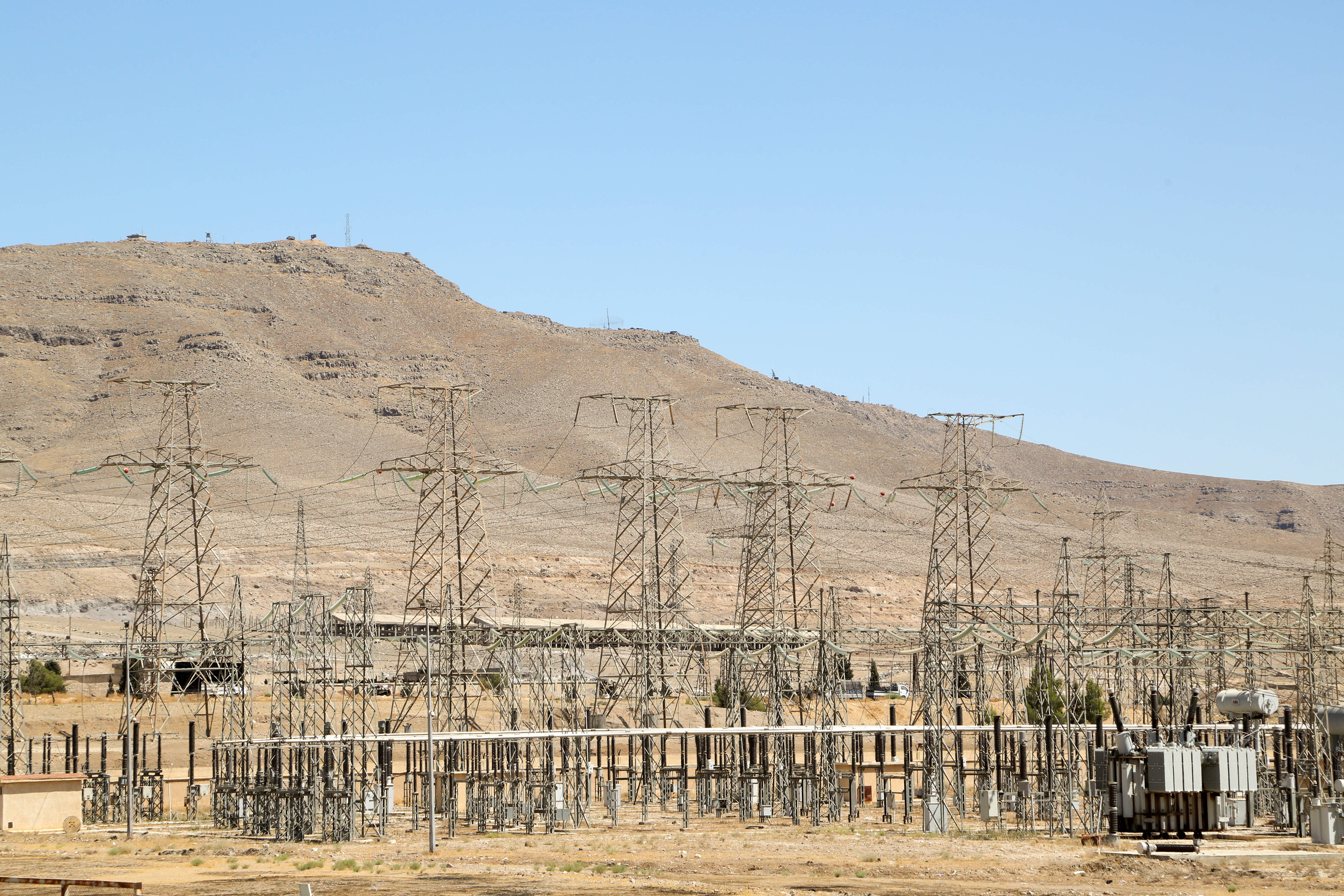 A view shows electricity pylons in Kiswah, Damascus suburbs, Syria