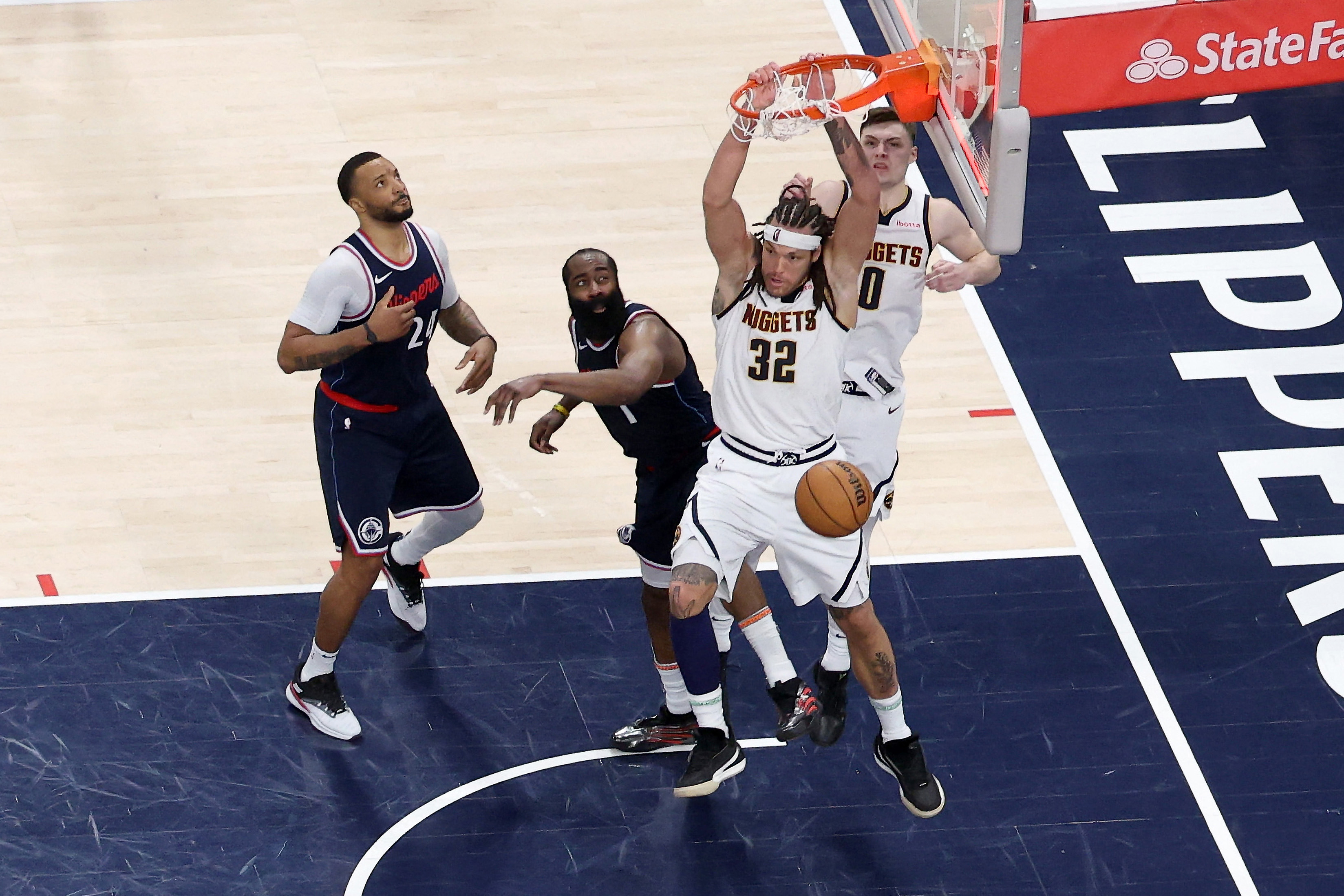 Aaron Gordon of the Denver Nuggets dunks the game-winning basket during the fourth quarter in Game 4 of the Western Conference First Round NBA Playoffs against the LA Clippers at Intuit Dome on April 26, 2025, in Inglewood, California, US