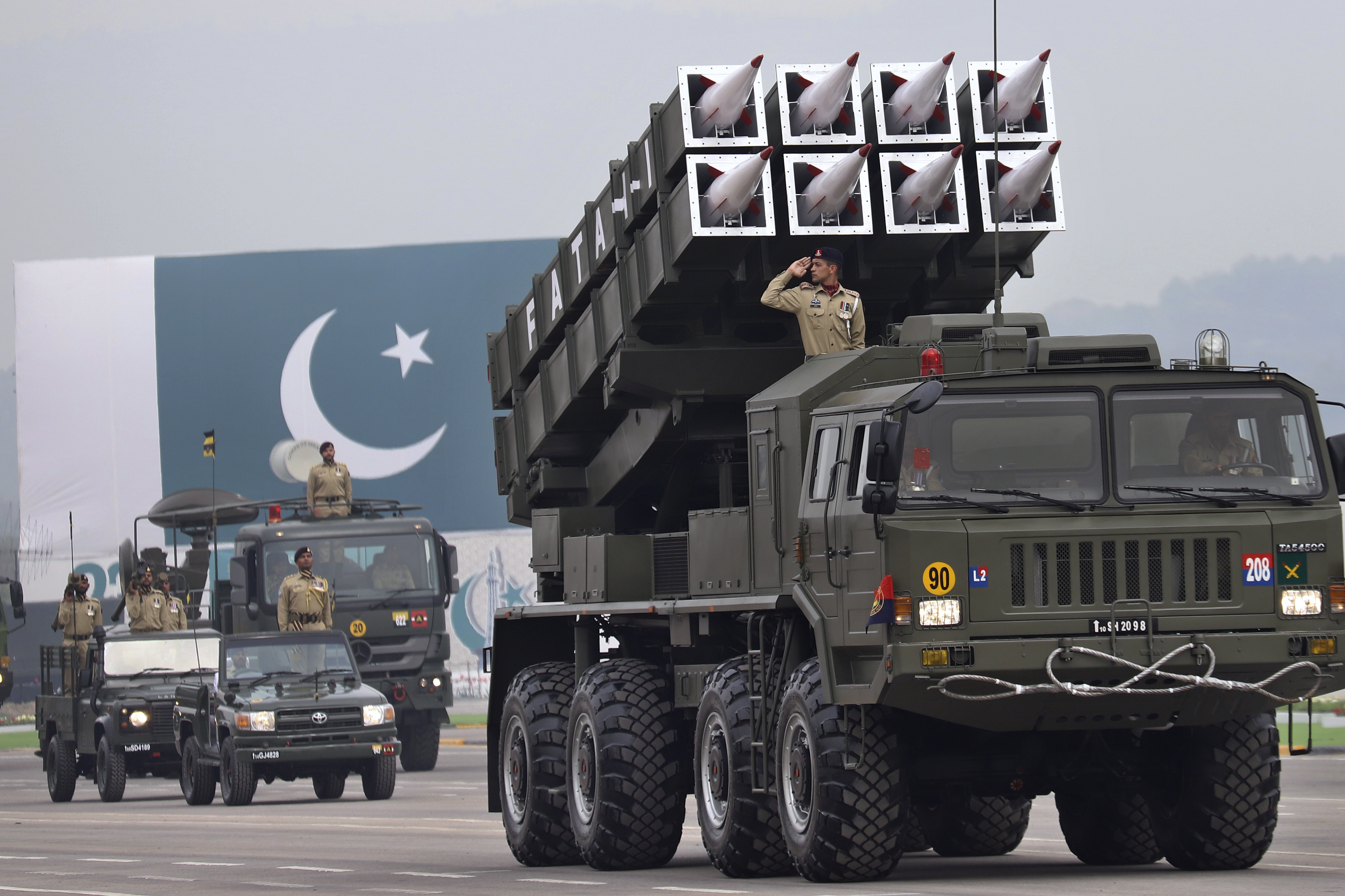 Pakistan-made surface-to-surface missiles Fatah-I and launcher are displayed during a military parade to mark Pakistan National Day in Islamabad, Pakistan, Saturday, March 23, 2024. Pakistanis celebrated their National Day with a military parade that's showcasing nation's elite army units and high-tech weaponry, including short, medium, and long-range missiles, tanks, fighter jets and other hardware. (AP Photo)
